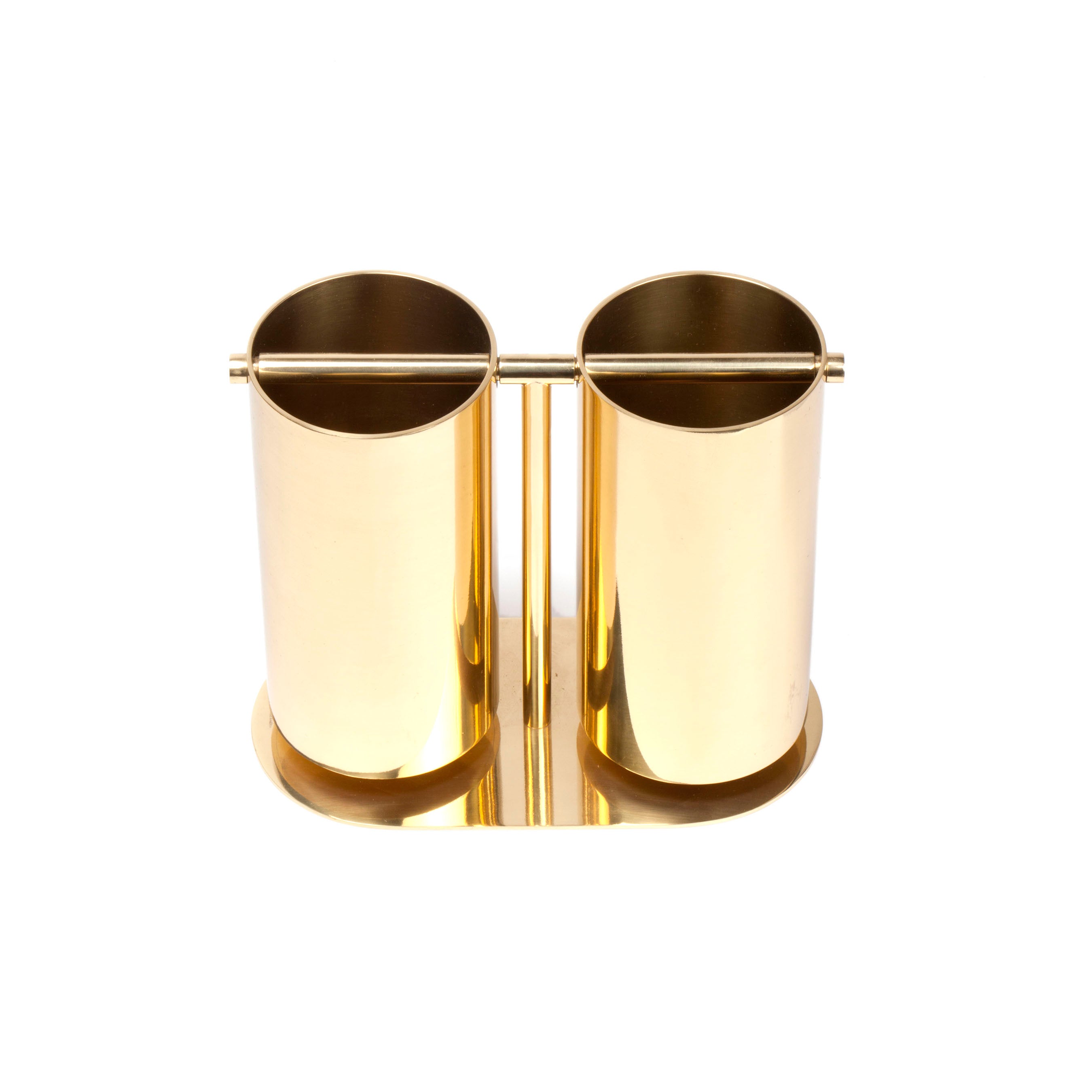 The Vase Double Swing #7246 by Werkstätte Carl Auböck features a modern gold cylindrical design with two tall polished cylinders linked by a horizontal bar on an oval base, embodying the minimalist and elegant allure of a Viennese design workshop.