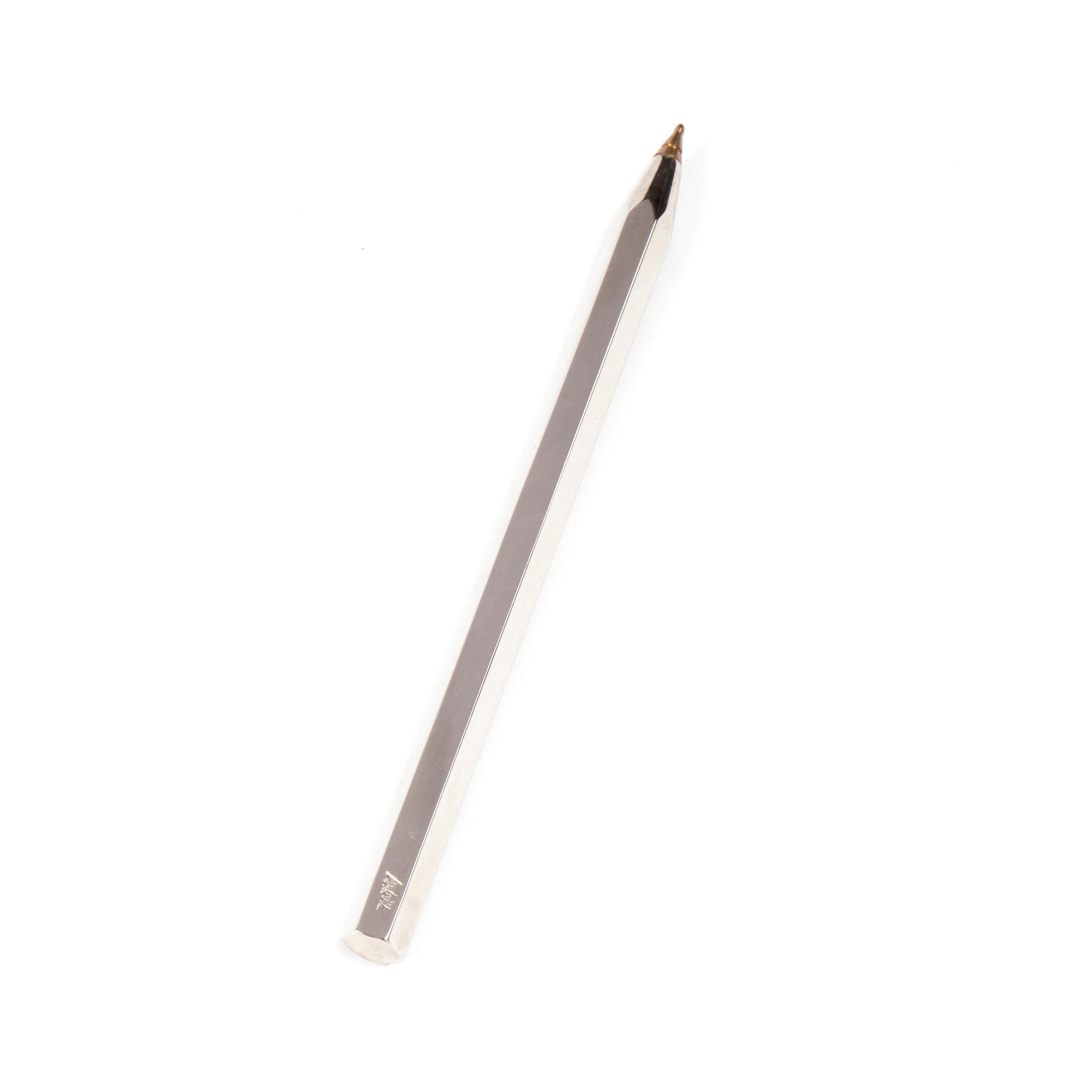 The Ball Point #5800 by Werkstätte Carl Auböck, featuring a sleek, transparent casing and visible internal elements, is elegantly positioned diagonally on a plain white background.