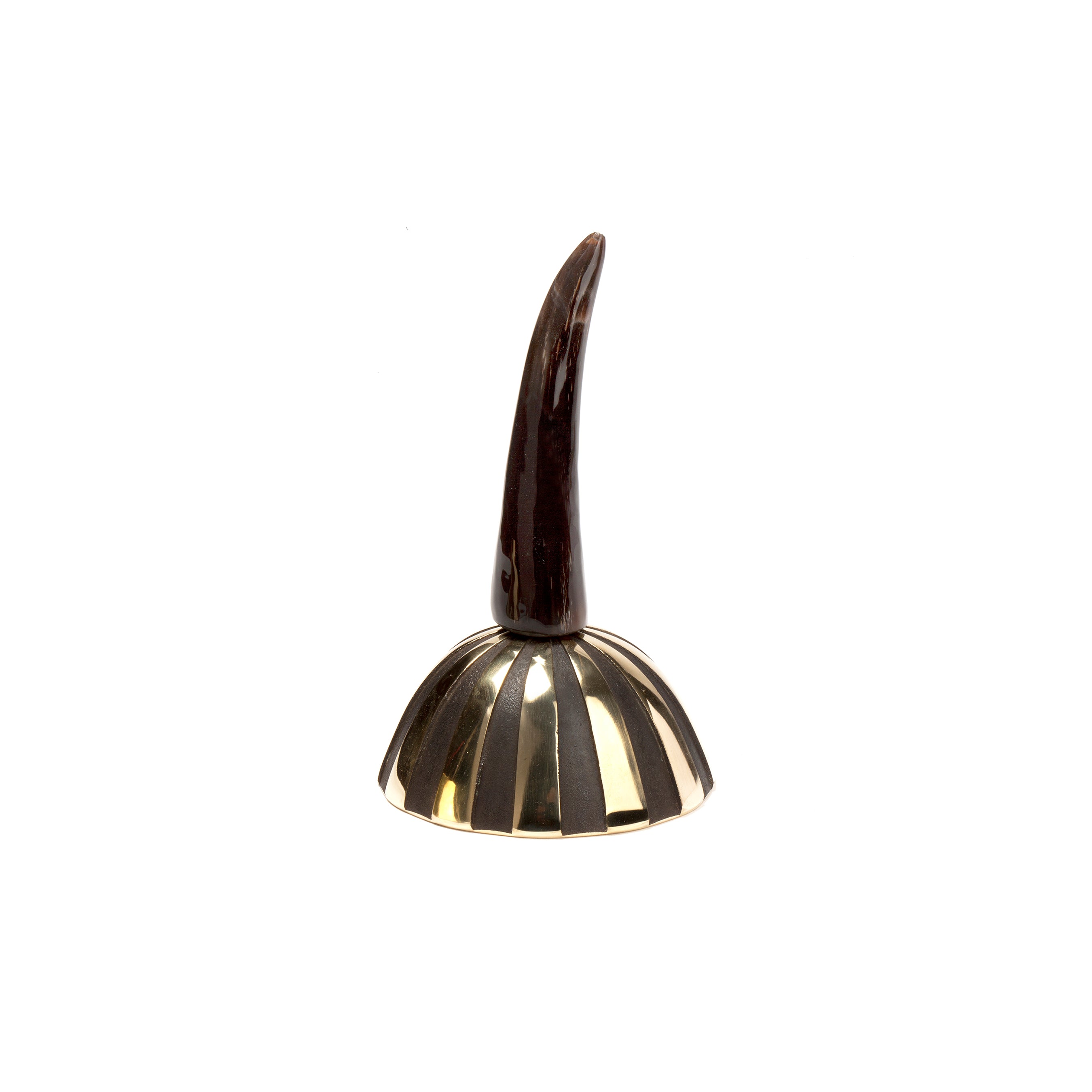 The Bell Zebra #3604 by Werkstätte Carl Auböck is a black and gold sculptural piece, recalling Viennese craftsmanship, featuring a shiny, horn-like curved top on a striped, dome-shaped base against a white backdrop.