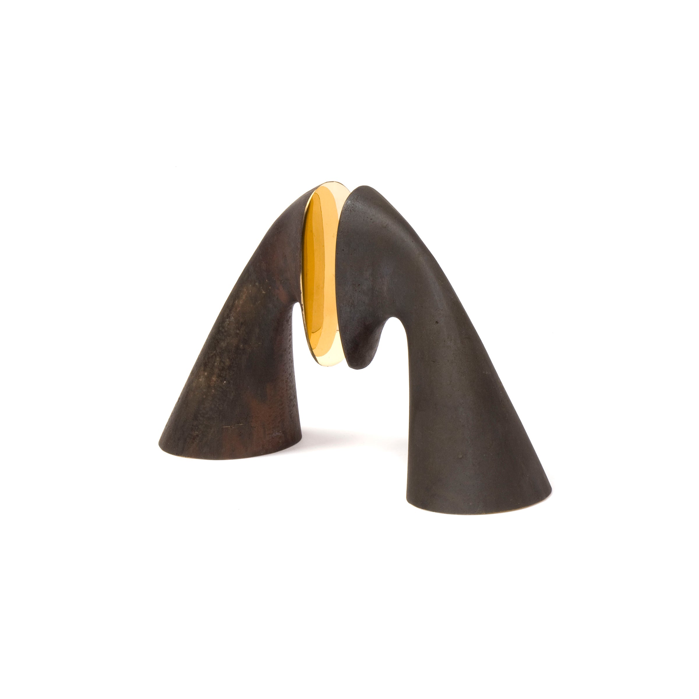 The Pair of bookends #3654 by Werkstätte Carl Auböck features two dark conical shapes leaning inward, connected by a reflective gold oval centerpiece, reminiscent of Carl Auböcks modern abstract style and the sophistication celebrated at the Triennale di Milano.