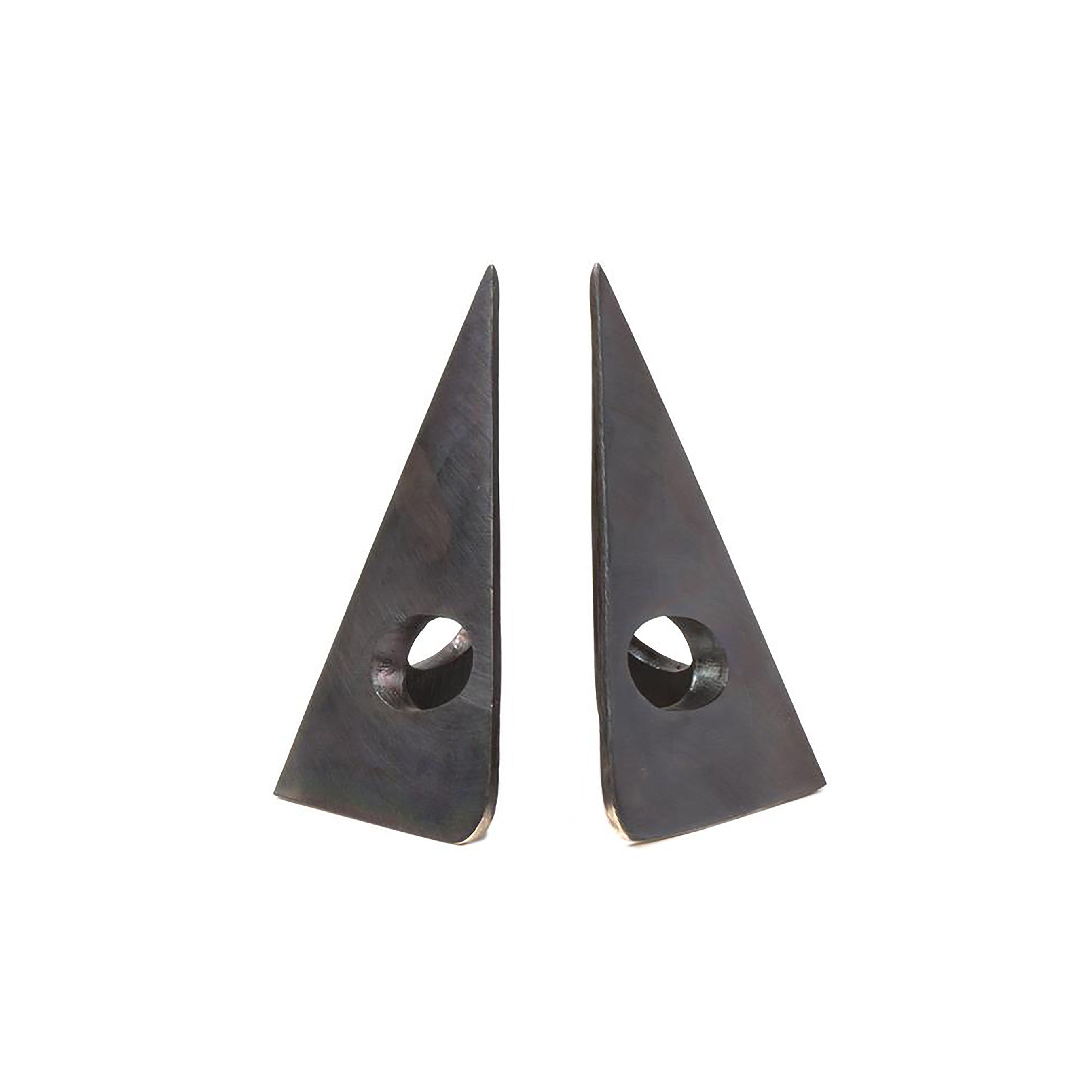 Two triangular metal pieces with holes near the base rest against each other on a white background, their smooth surfaces subtly reflecting light. This geometric elegance is reminiscent of Werkstätte Carl Auböcks style, showcasing the sleek design of the Pair of Bookends #4100.
