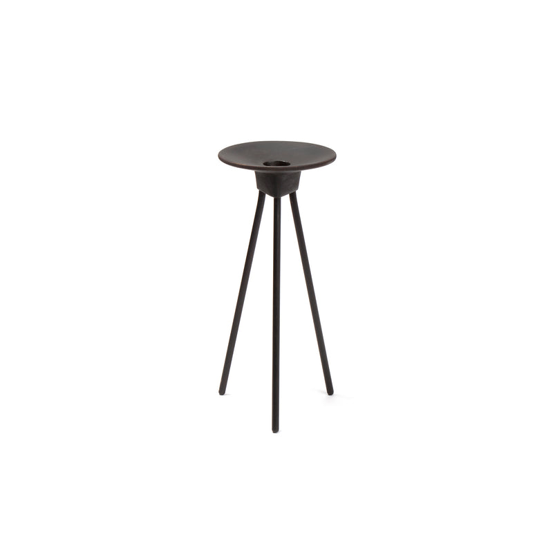 The Werkstätte Carl Auböck Candlestick #3980 is a sleek, modern black metal side table with a circular top, three slender legs, and a central indentation, embodying minimalist design inspired by Carl Auböck.