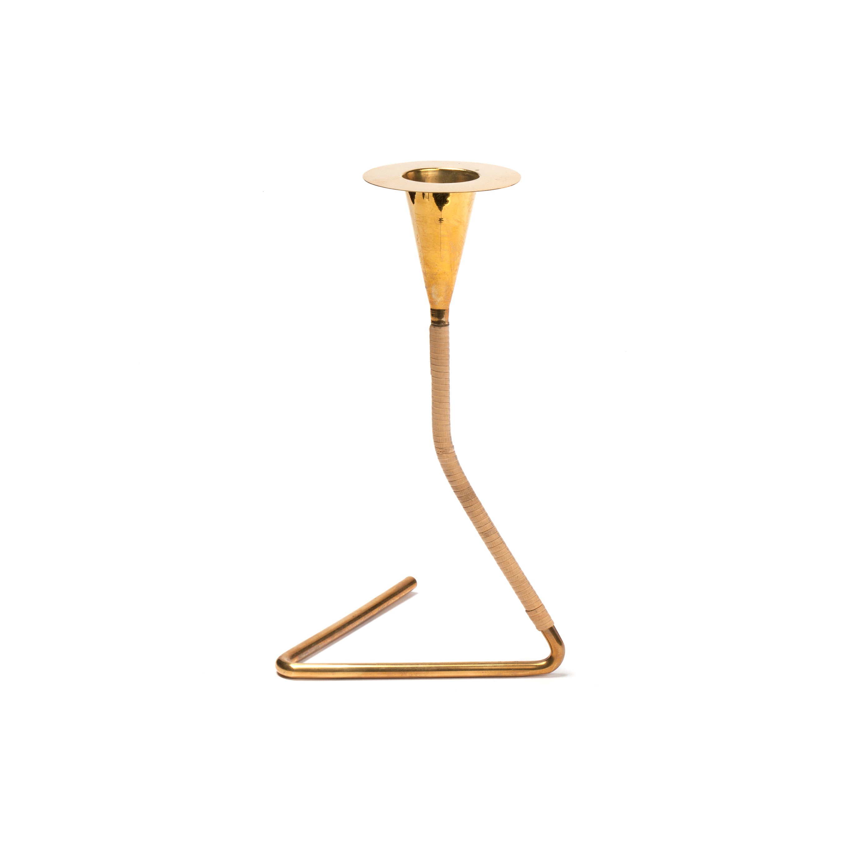 Candlestick Cobra #4162 by Werkstätte Carl Auböck is a modern gold metal candle holder with a conical cup on a slender, curved stem wrapped in lighter material. The base has an angled minimalistic design against a plain white background.