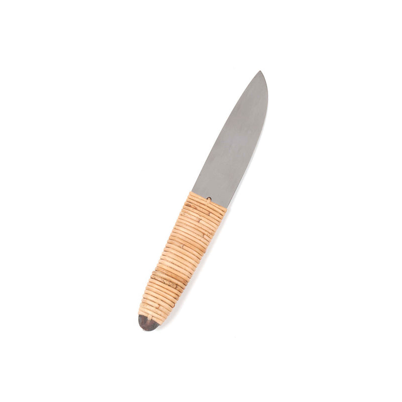 The Cheese Knife #4828 from Werkstätte Carl Auböck features a short, wide blade and a handle with light brown wrapping, evocative of Auböcks style. It rests diagonally on a plain white background, echoing the elegance typical of a Viennese townhouse.
