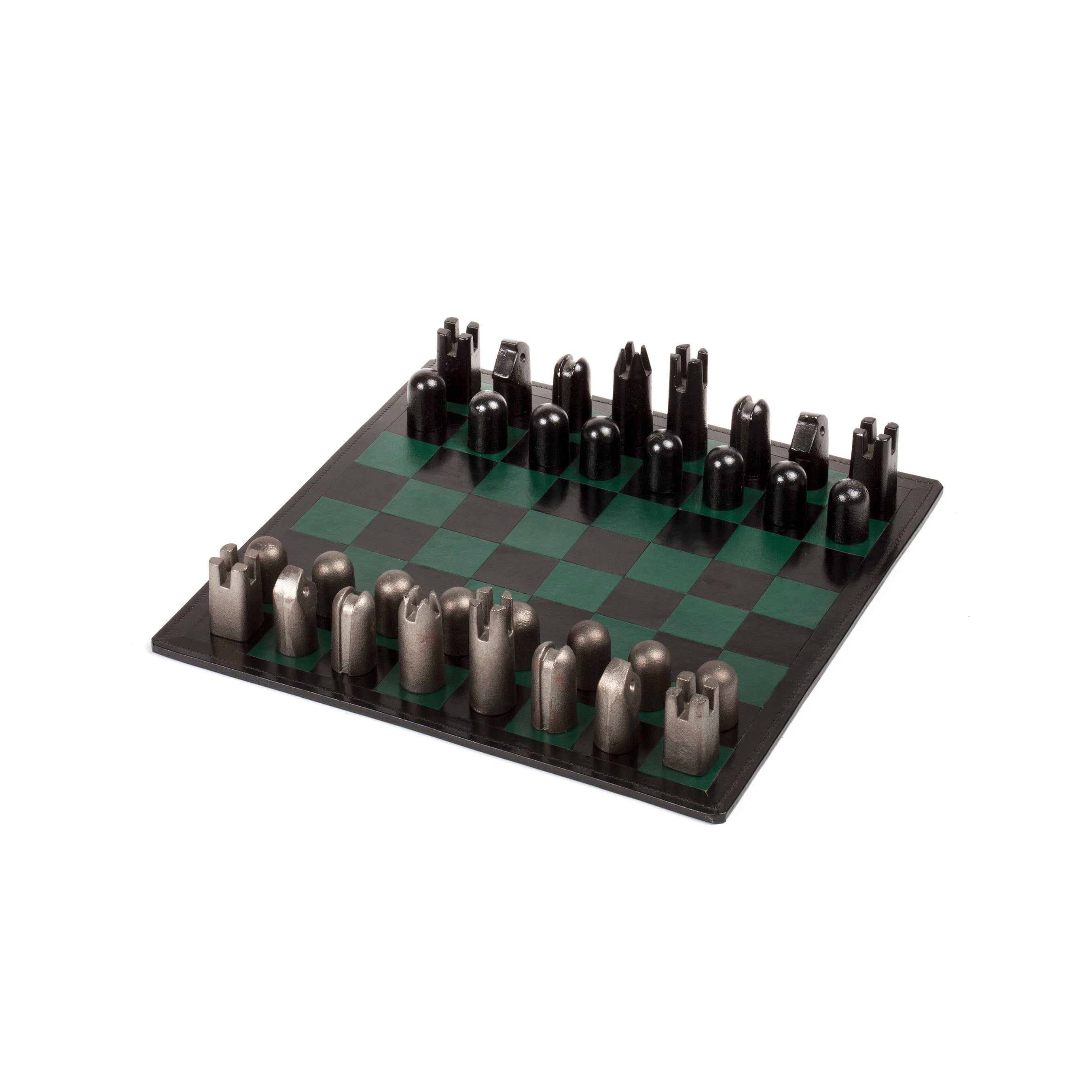 The Chess Board and Chess Pieces #5606 by Werkstätte Carl Auböck features modern metallic pieces with a timeless Wiener Bronzen elegance. The board, with green and black squares, complements the minimalist design, while the uniquely shaped pieces are expertly arranged in starting positions.