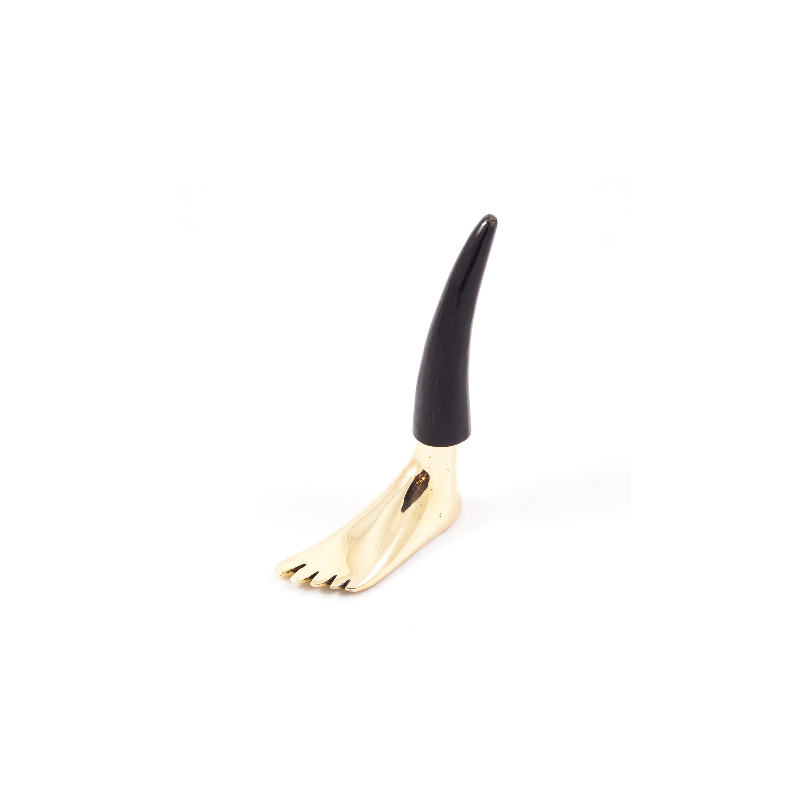 The Corkscrew Foot #4275H by Werkstätte Carl Auböck, a gold sculpture with a high arch and elongated black heel, captures the surreal artistry reminiscent of Wiener Bronzen craftsmanship.