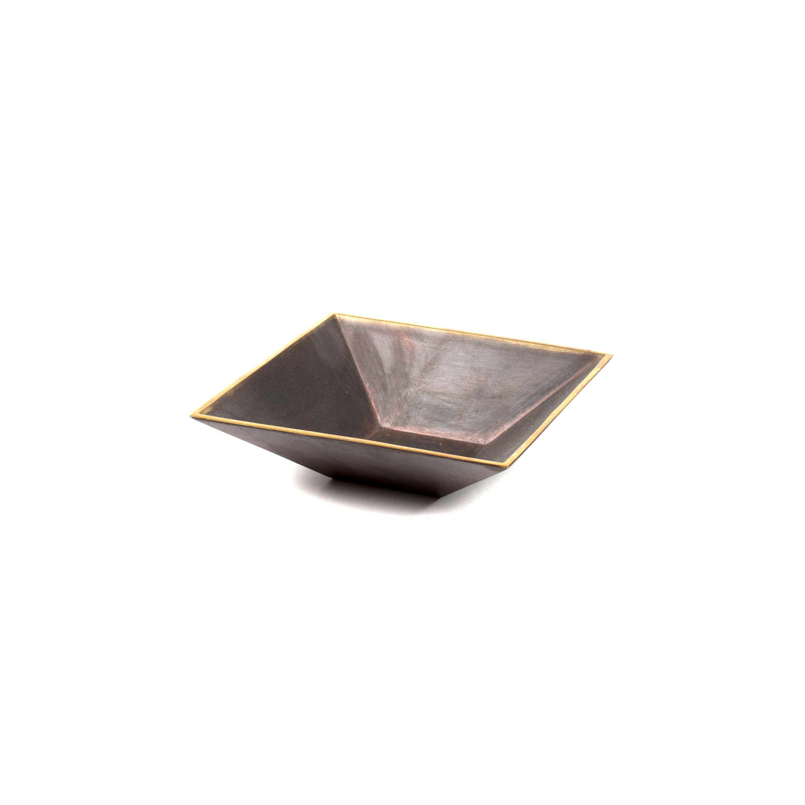 A square, dark, shallow bowl with a subtle metallic sheen and golden trim, reminiscent of an Auböck design, set against a plain white background is Werkstätte Carl Auböcks Dish #4482.