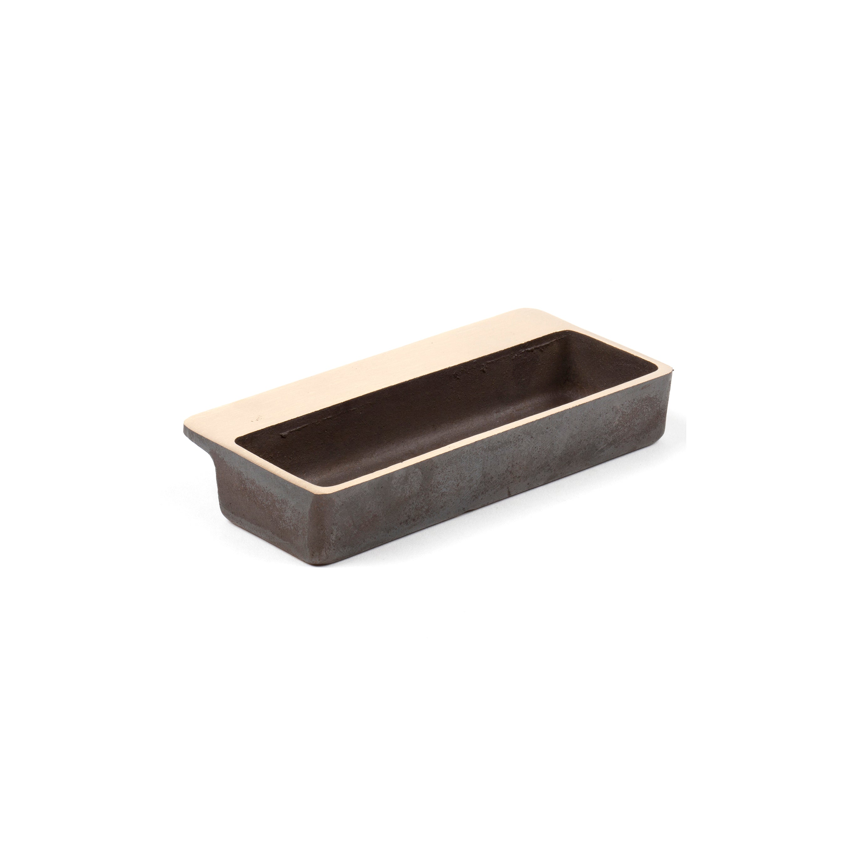 Dish #4609 by Werkstätte Carl Auböck, a rectangular black loaf pan featuring a beige rim inspired by Viennese townhouse designs, is shown at a slight angle on a plain white background.