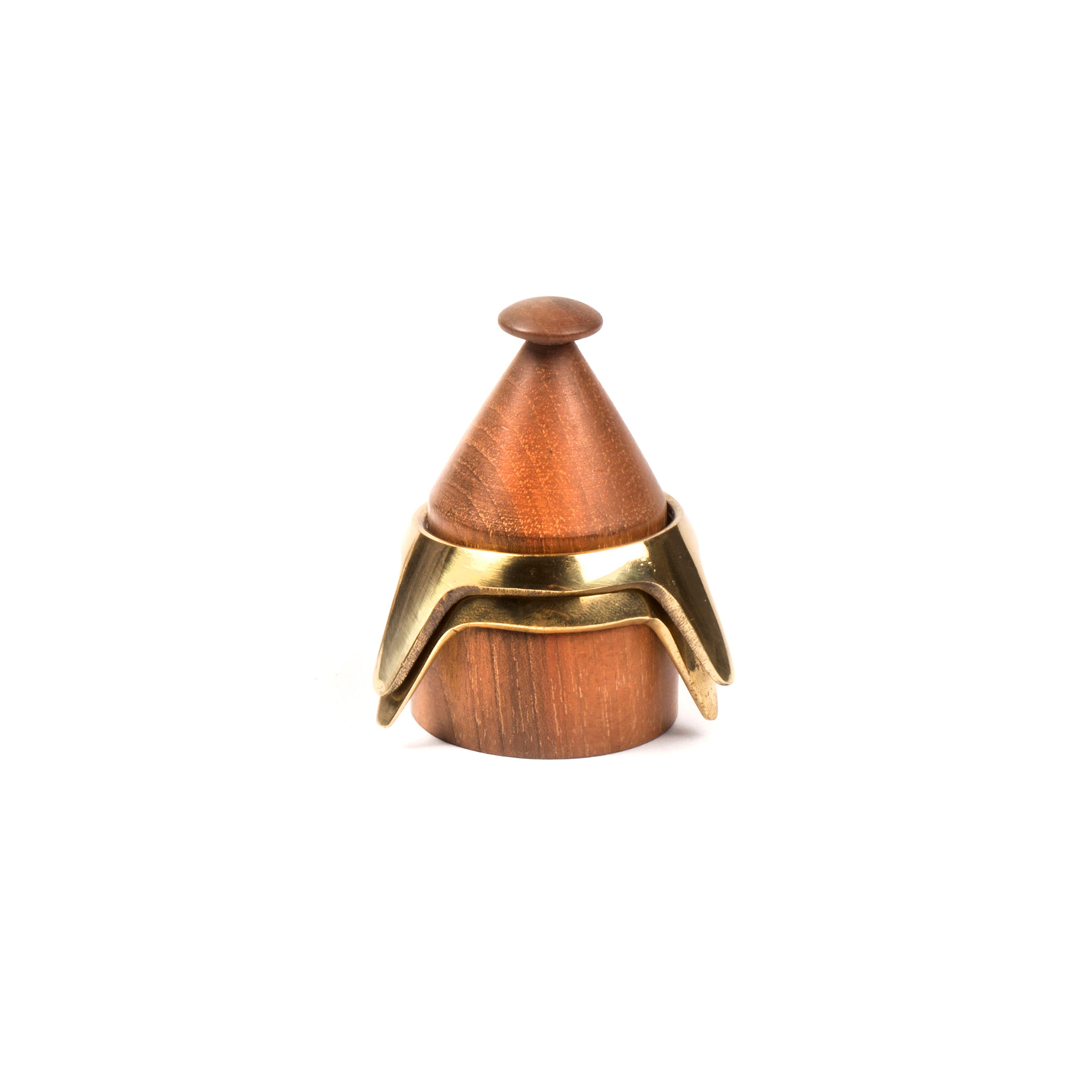 The Werkstätte Carl Auböck Egg Cup #4153-1 is a small wooden container with a conical lid and a bronze-colored metal band, reminiscent of a decorative keepsake box in a Viennese townhouse.