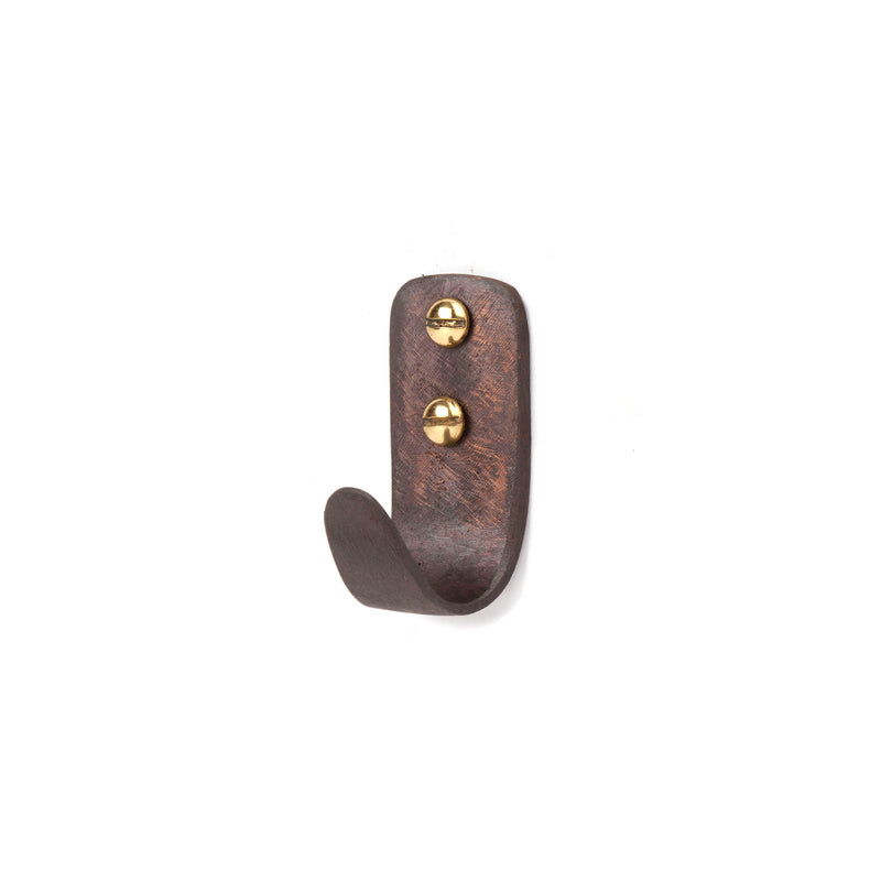 Set of 3 Hooks #4330 by Werkstätte Carl Auböck: Antique bronze single coat hook with two gold screws, crafted in a Viennese-style and elegantly displayed on a white background.