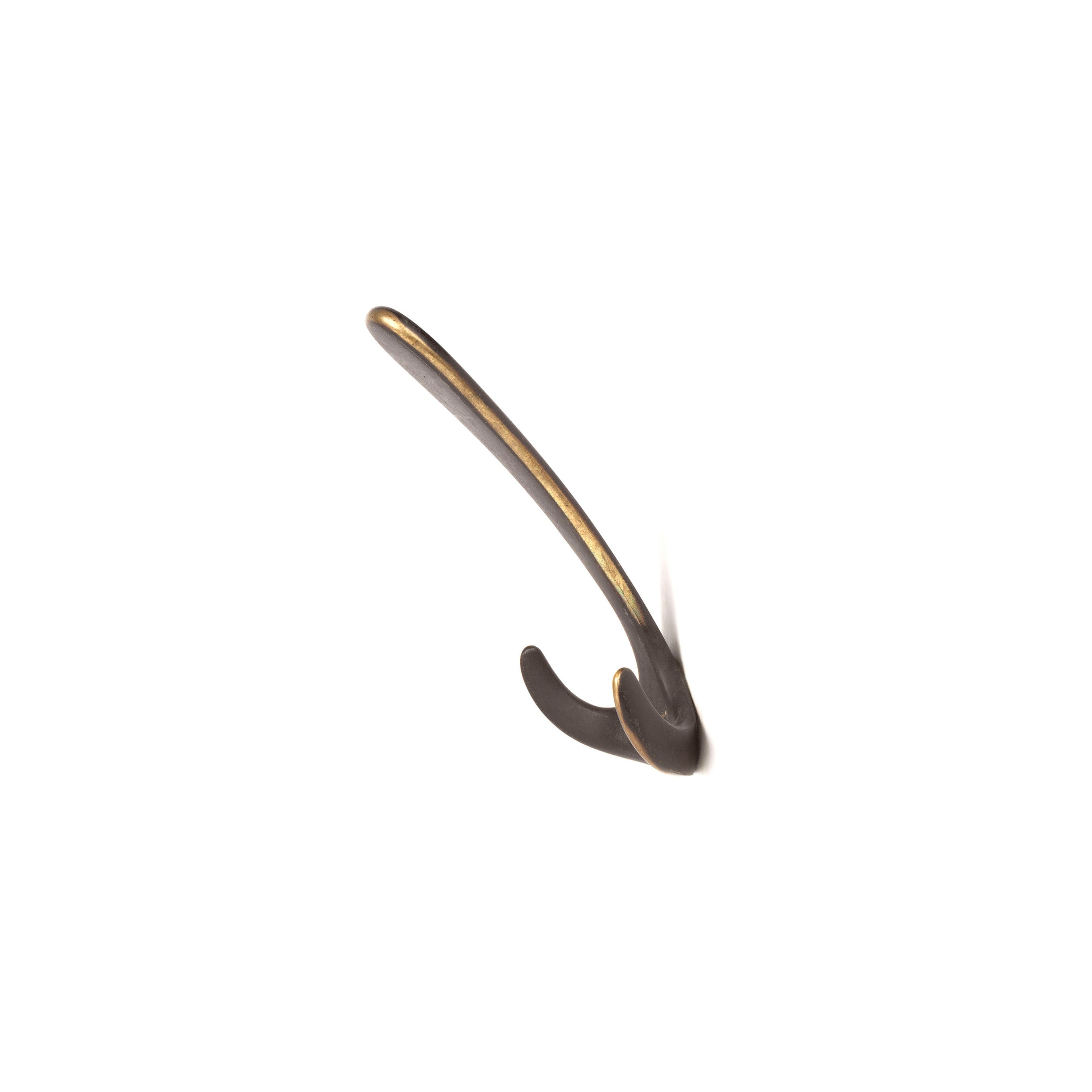A single bronze-colored hook from the Werkstätte Carl Auböck Set of 3 Hooks #4982, featuring a sleek, curved design reminiscent of Viennese craftsmanship, is mounted on a white background.