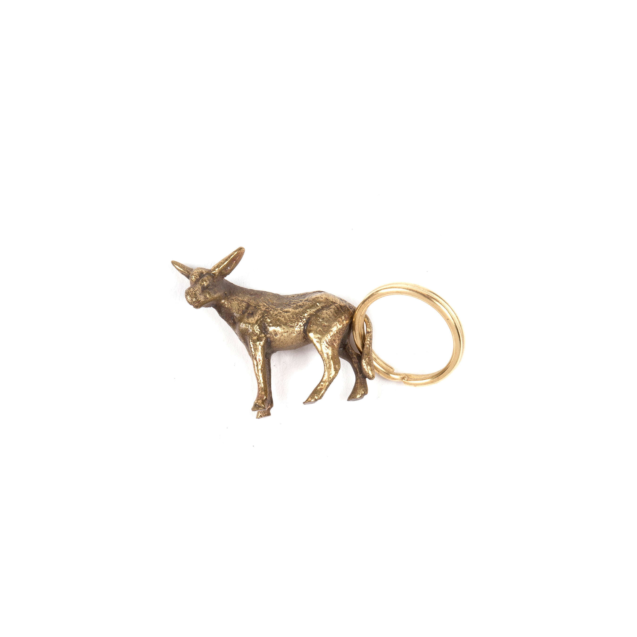 The Keyring Donkey #5608 by Werkstätte Carl Auböck features a detailed brass donkey with a golden loop, capturing the Wiener Bronzen style, set against a white background.