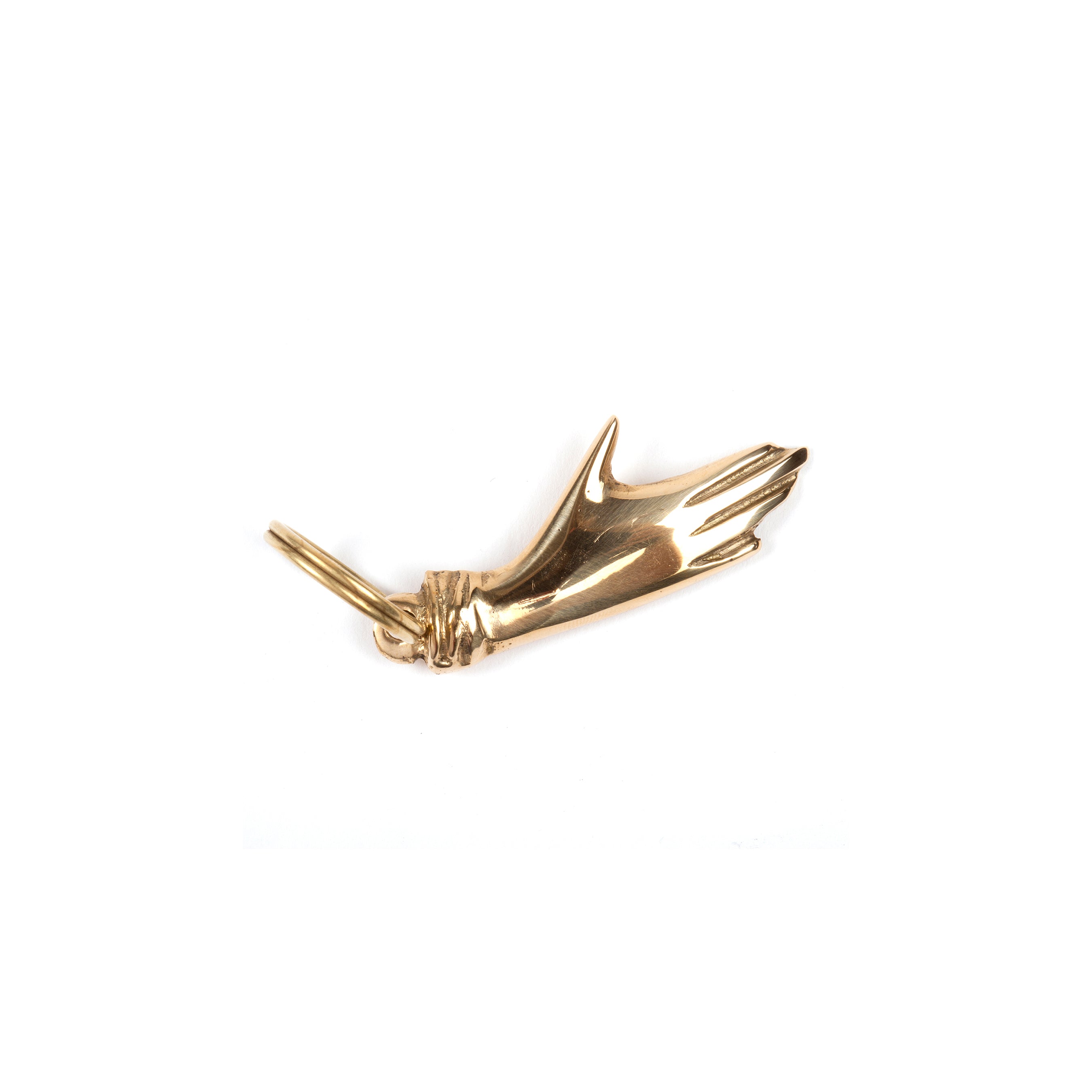 The Keyring Hand #5734 from Werkstätte Carl Auböck features a brass keychain in a hand shape with elongated fingers resembling antlers or branches. Its intricate design captures the timeless aesthetic of a Viennese workshop, elegantly showcased on a white background.