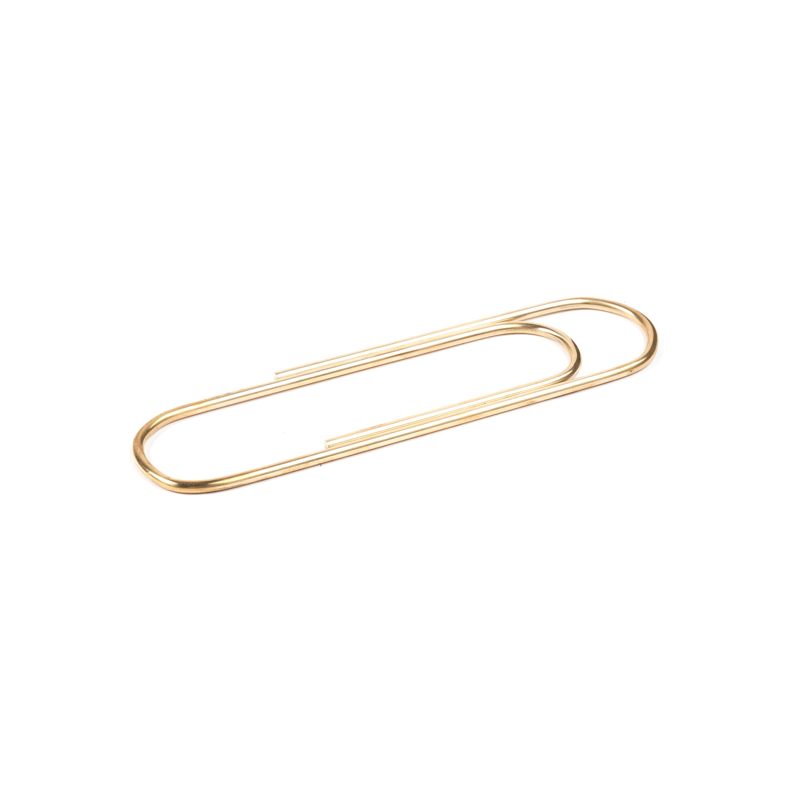 Paper Clip #4751 by Werkstätte Carl Auböck, styled in gold against a white background, embodies the design essence reminiscent of innovations at the Triennale di Milano 1954.