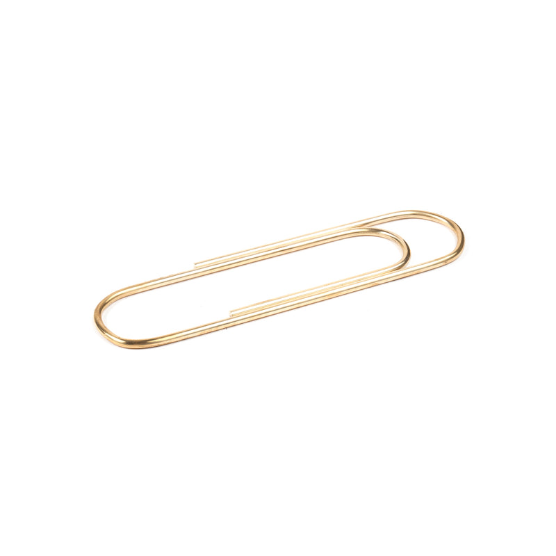 Paper Clip #4751 by Werkstätte Carl Auböck, styled in gold against a white background, embodies the design essence reminiscent of innovations at the Triennale di Milano 1954.
