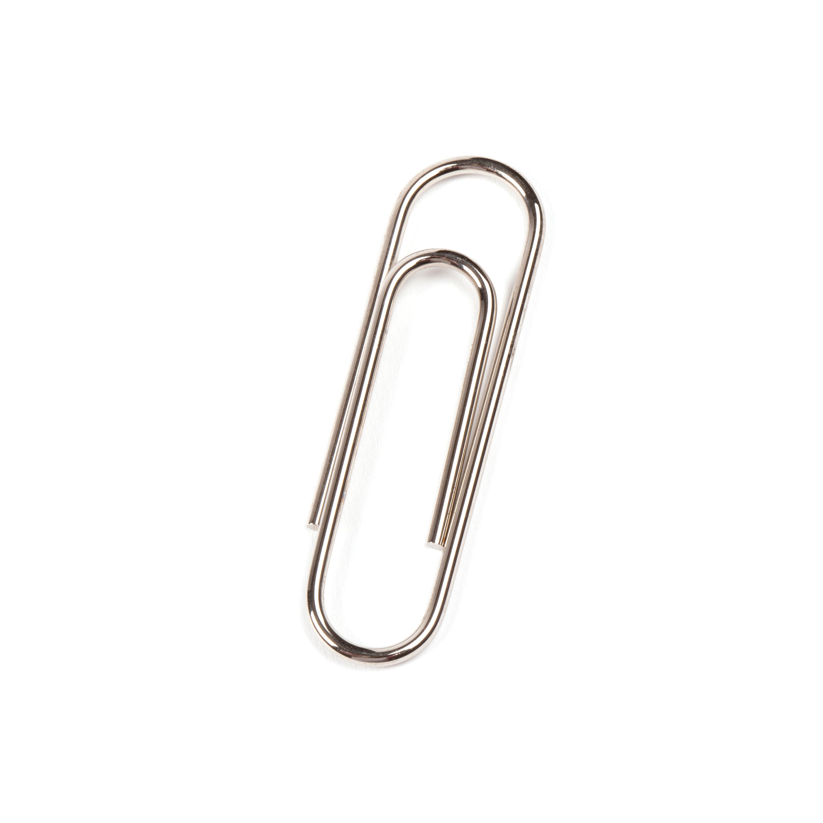 On a white background, Paper Clip #5647 by Werkstätte Carl Auböck rests at a slight angle. Its familiar looped shape echoes the timeless elegance and craftsmanship of Auböck designs.