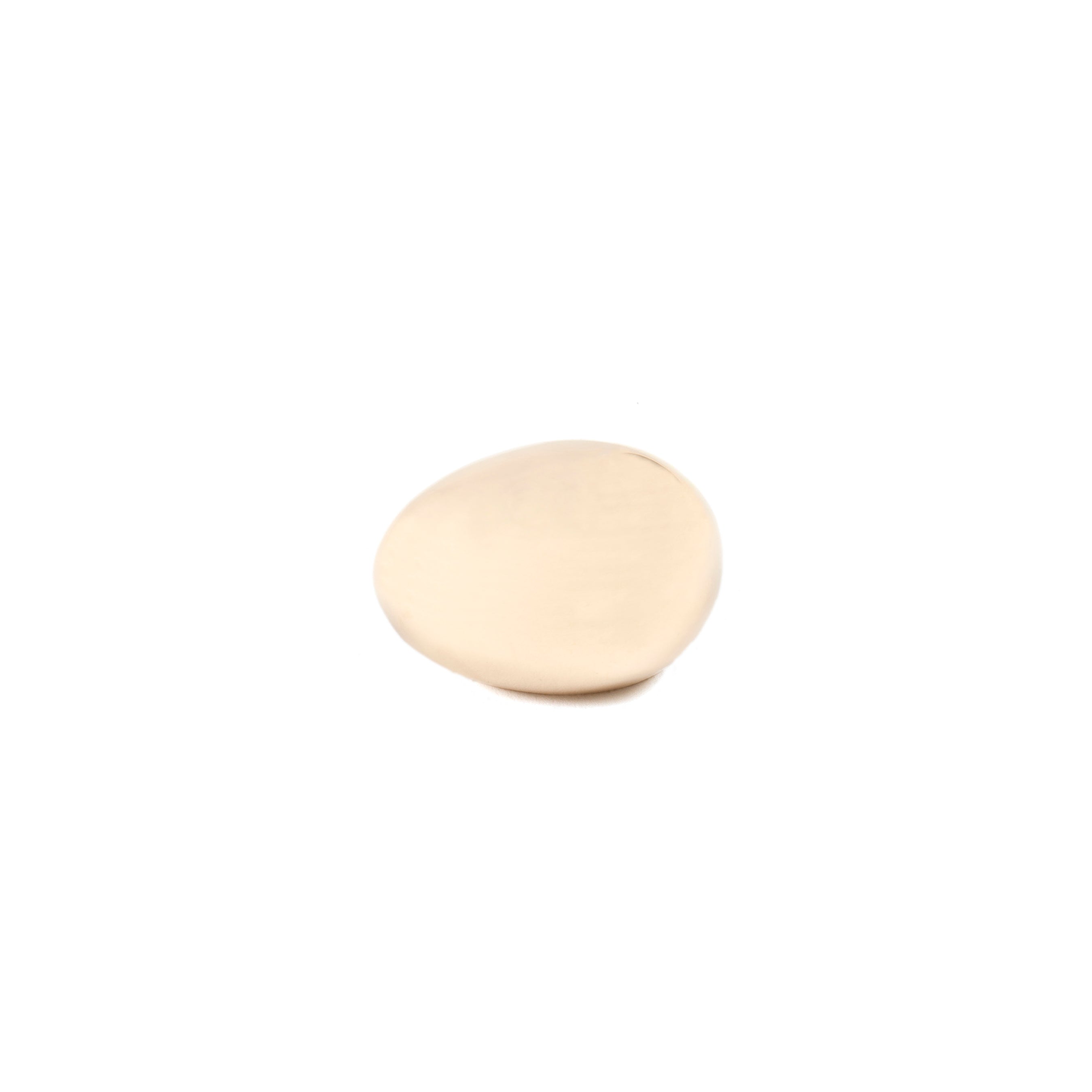 A smooth, round beige pebble reminiscent of Auböck design is the Paperweight Egg #4867 by Werkstätte Carl Auböck, set against a plain white background.