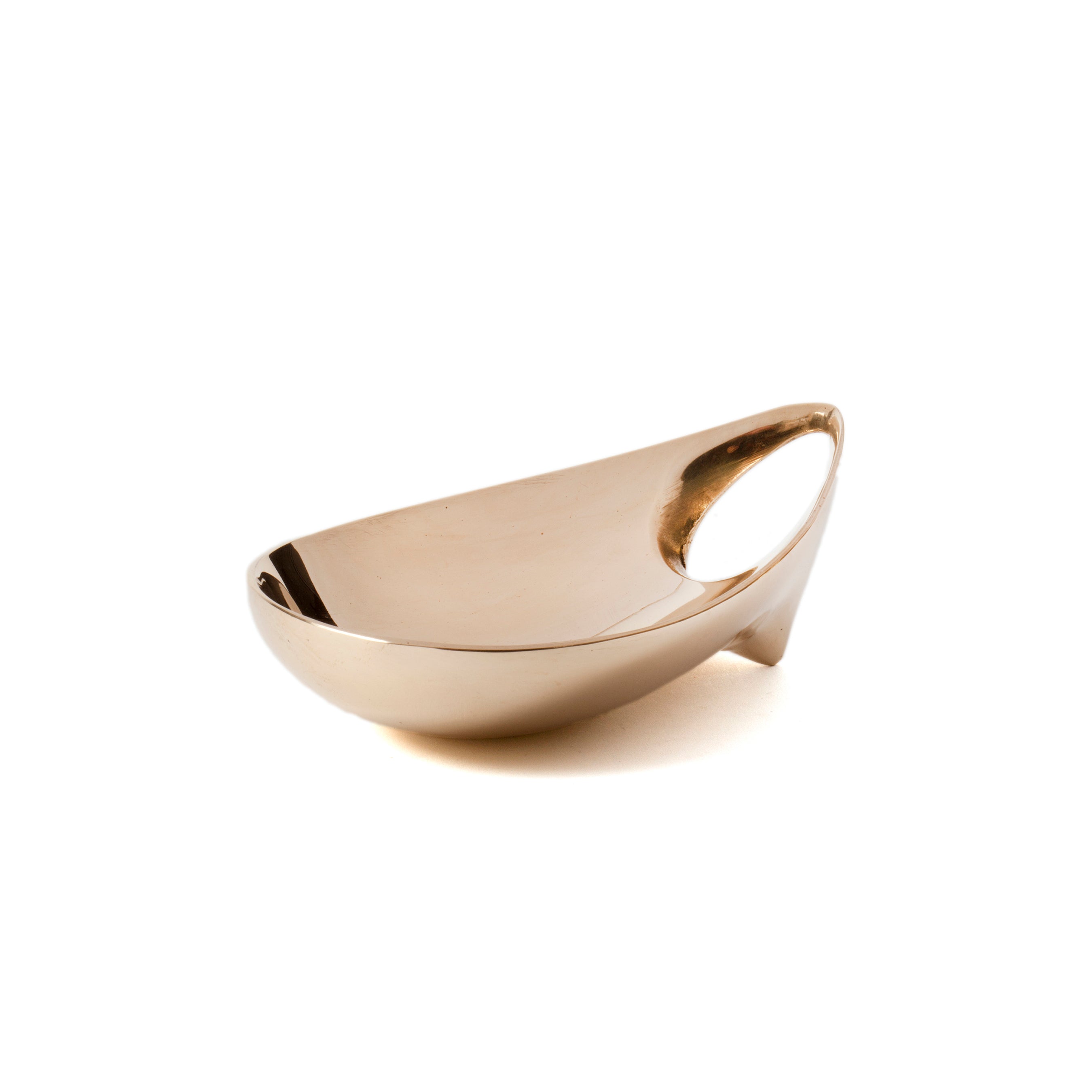 The Pipe Ashtray #3633 by Werkstätte Carl Auböck is a modern bronze sculpture with smooth curves and a polished surface. Its large oval cutout offers a unique asymmetrical design, enhanced by the plain white background, showcasing its Viennese workshop charm.