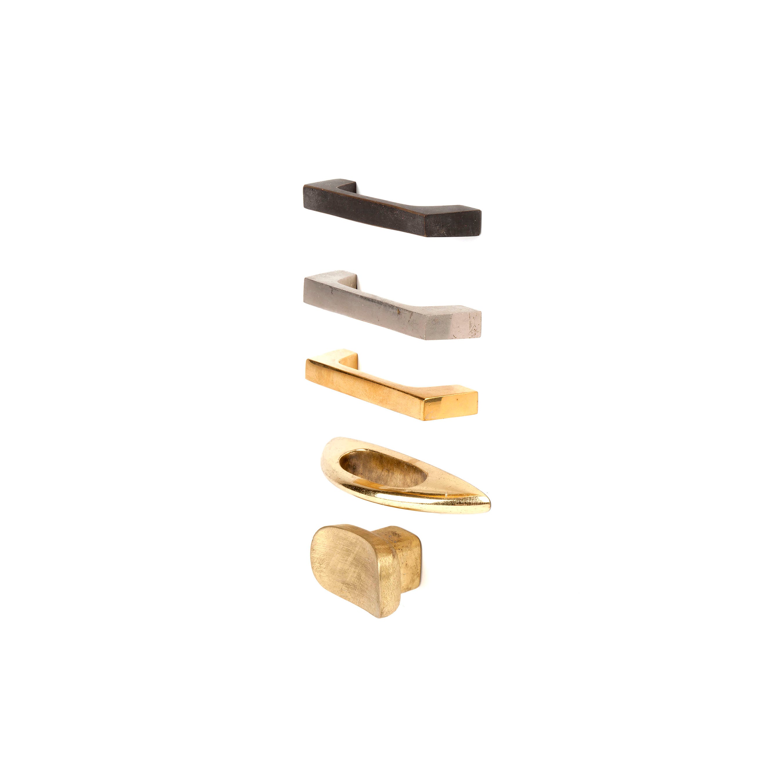 Five unique drawer handles, inspired by Werkstätte Carl Auböck’s Puller #6030/10, are vertically displayed against a white background. The handles vary in shape and material, showcasing metallic finishes like silver, gold, and rich brass.