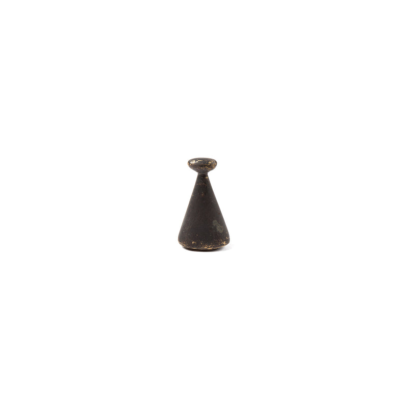 A small, dark, vintage Werkstätte Carl Auböck Snuffer #4117B features a cone-shaped base and round top, echoing the elegant artistry of Viennese townhouses or refined Wiener Bronzen contours, isolated on a white background.