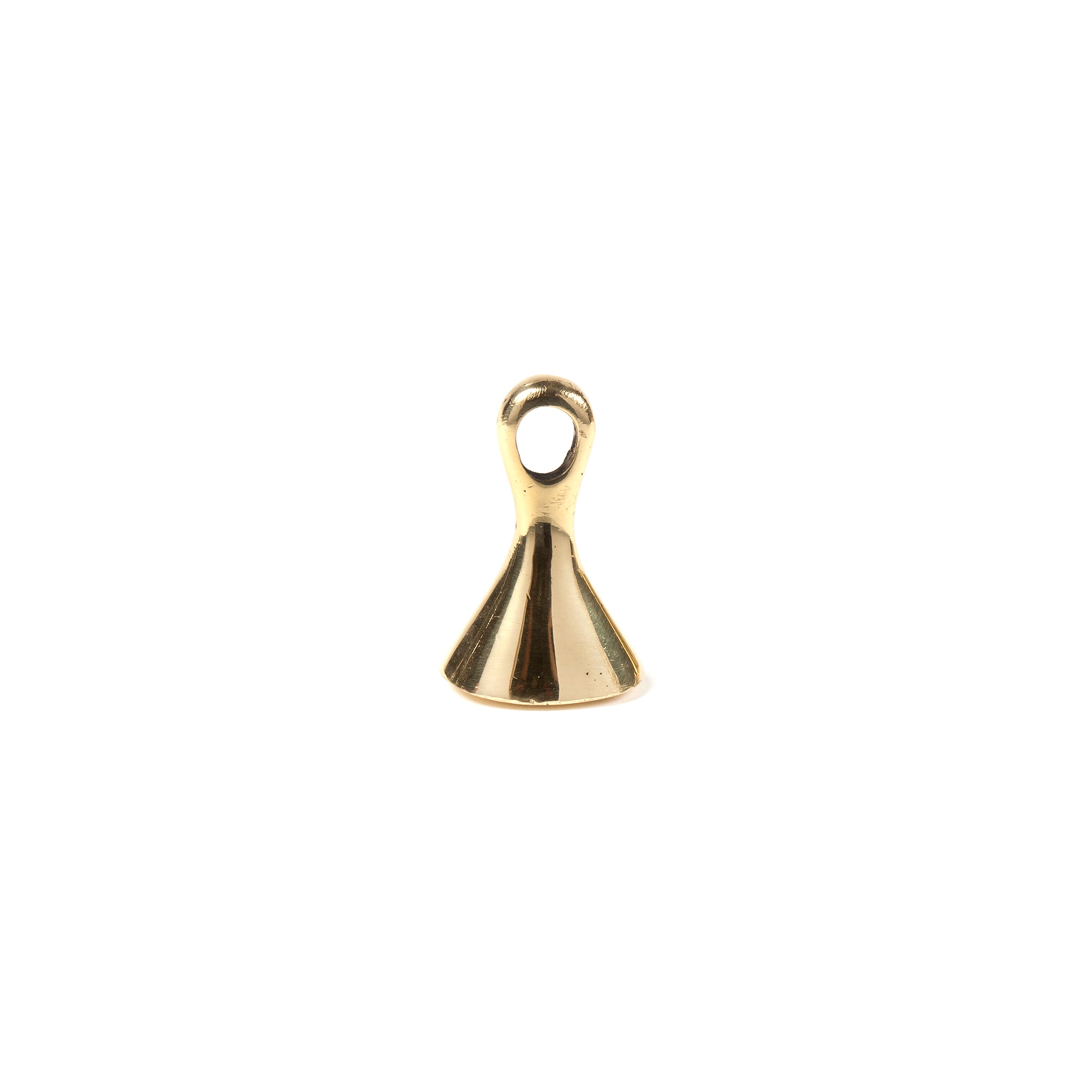 The Snuffer #4117D by Werkstätte Carl Auböck features a small, shiny brass-colored metal design with a flat, conical base and a loop on top, isolated against a plain white background.