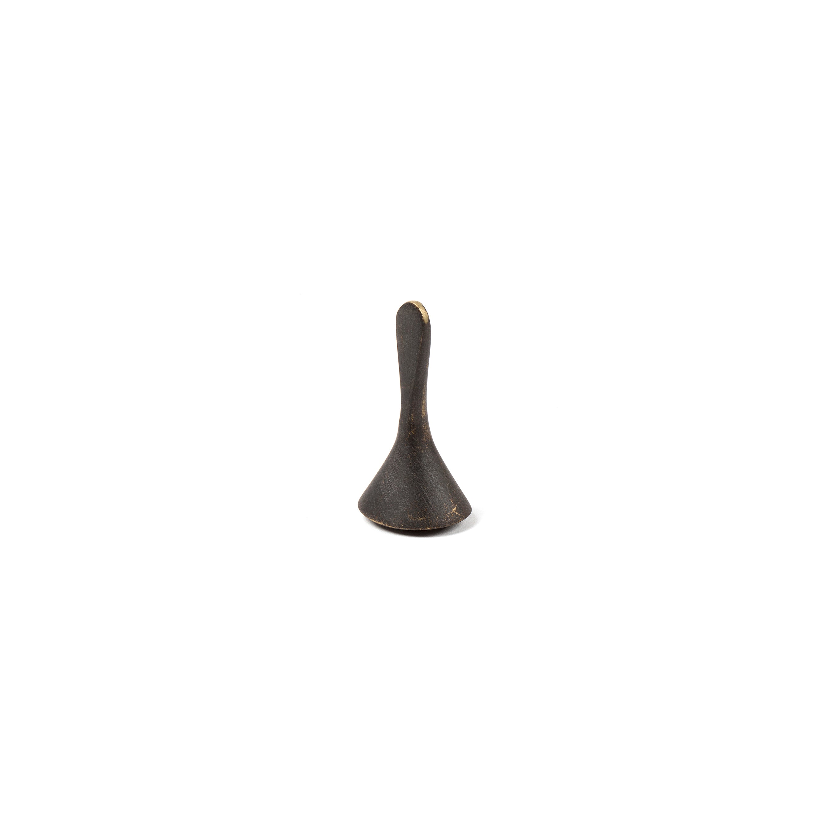The Werkstätte Carl Auböck Snuffer #4117A is a small, dark bronze piece with a smooth conical base and tapered handle, showcased on a white background.