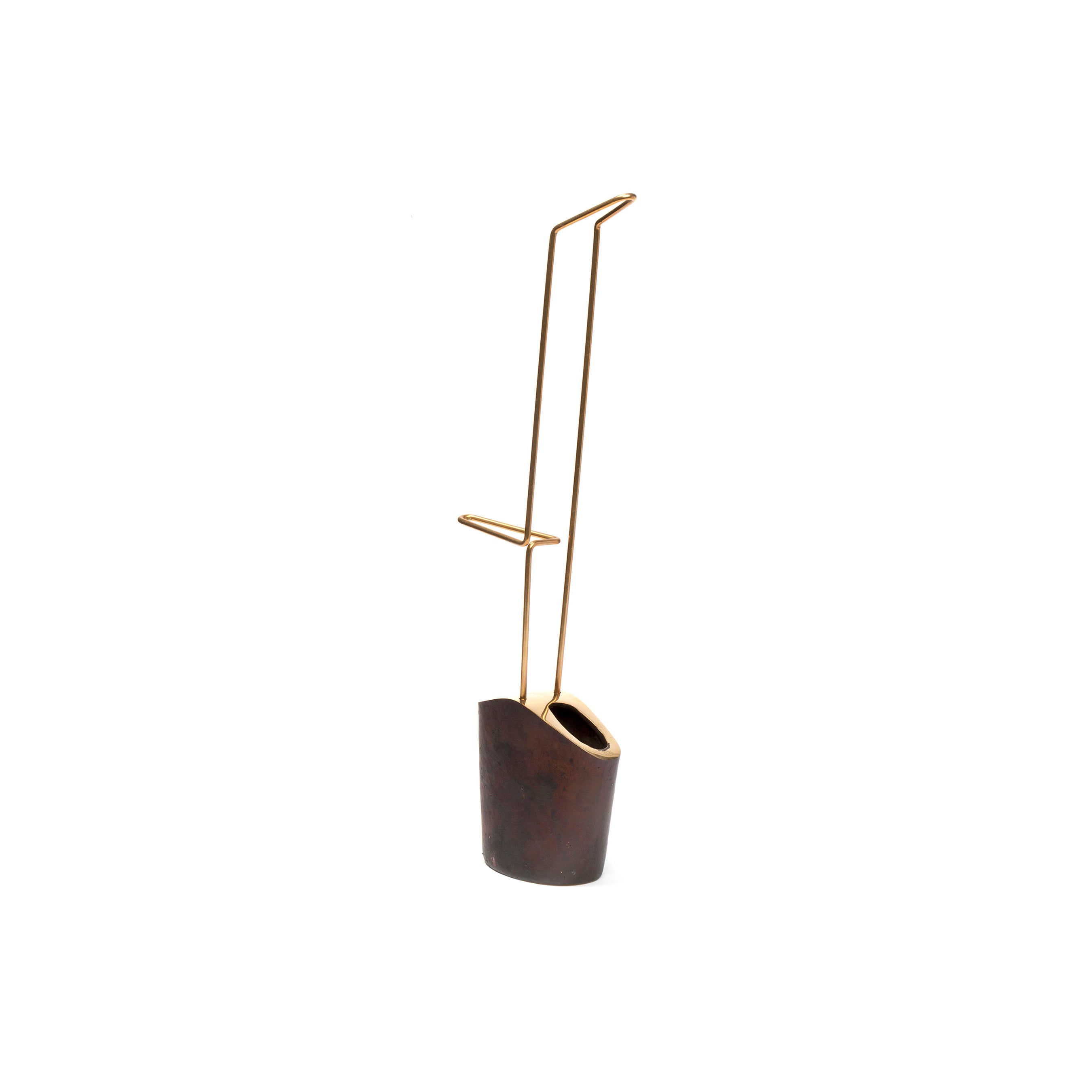 The Vase #3853 by Werkstätte Carl Auböck is a modern, minimalist sculpture made of thin, gold-colored metal rods extending vertically from a small dark cylindrical base with an oval opening, forming geometric shapes reminiscent of Triennale di Milano exhibits.
