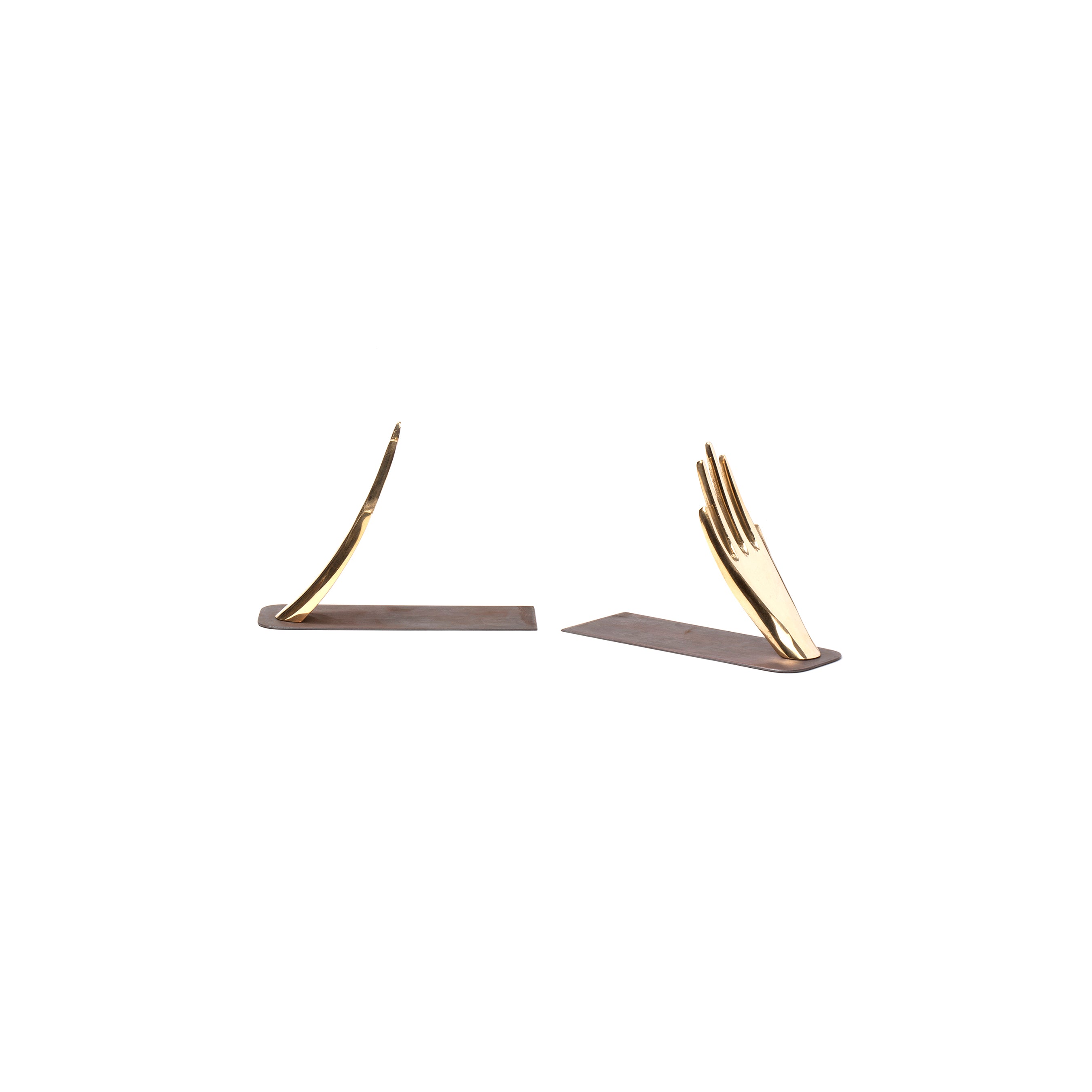 A pair of abstract golden sculptures resembling hands are styled as bookends and mounted on rectangular bases. Created by Werkstätte Carl Auböck, the sculptures feature fingers gracefully extended upwards against a plain white background.