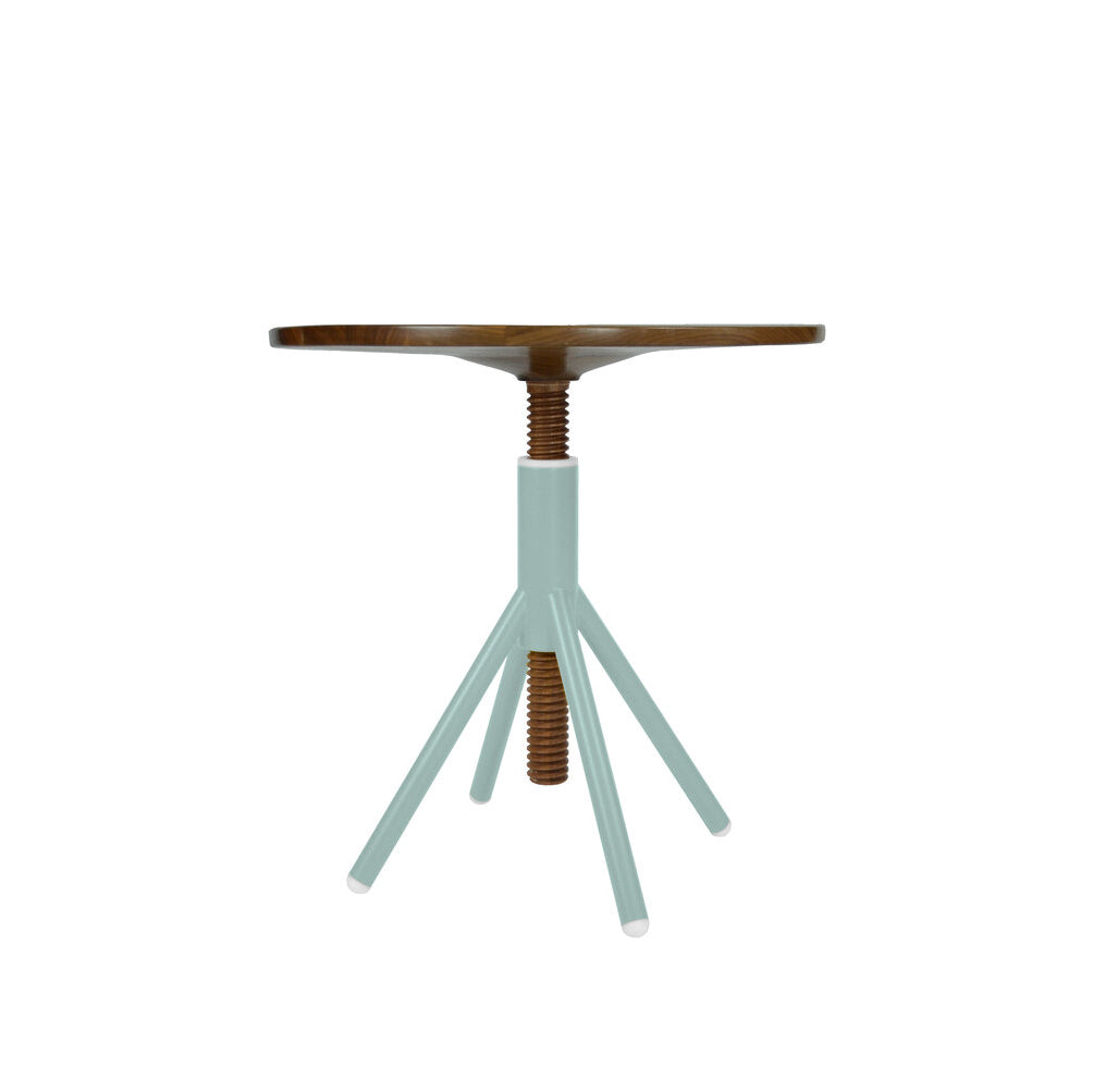 The Thread Family - Bistro Table by Coordination Berlin is a small round table with a walnut wooden top, a light blue base with four angled legs, and a central adjustable screw support for height versatility.