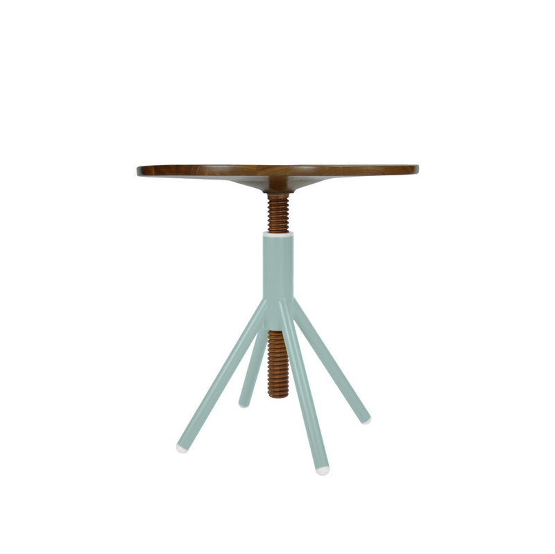 The Thread Family - Bistro Table by Coordination Berlin is a small round table with a walnut wooden top, a light blue base with four angled legs, and a central adjustable screw support for height versatility.