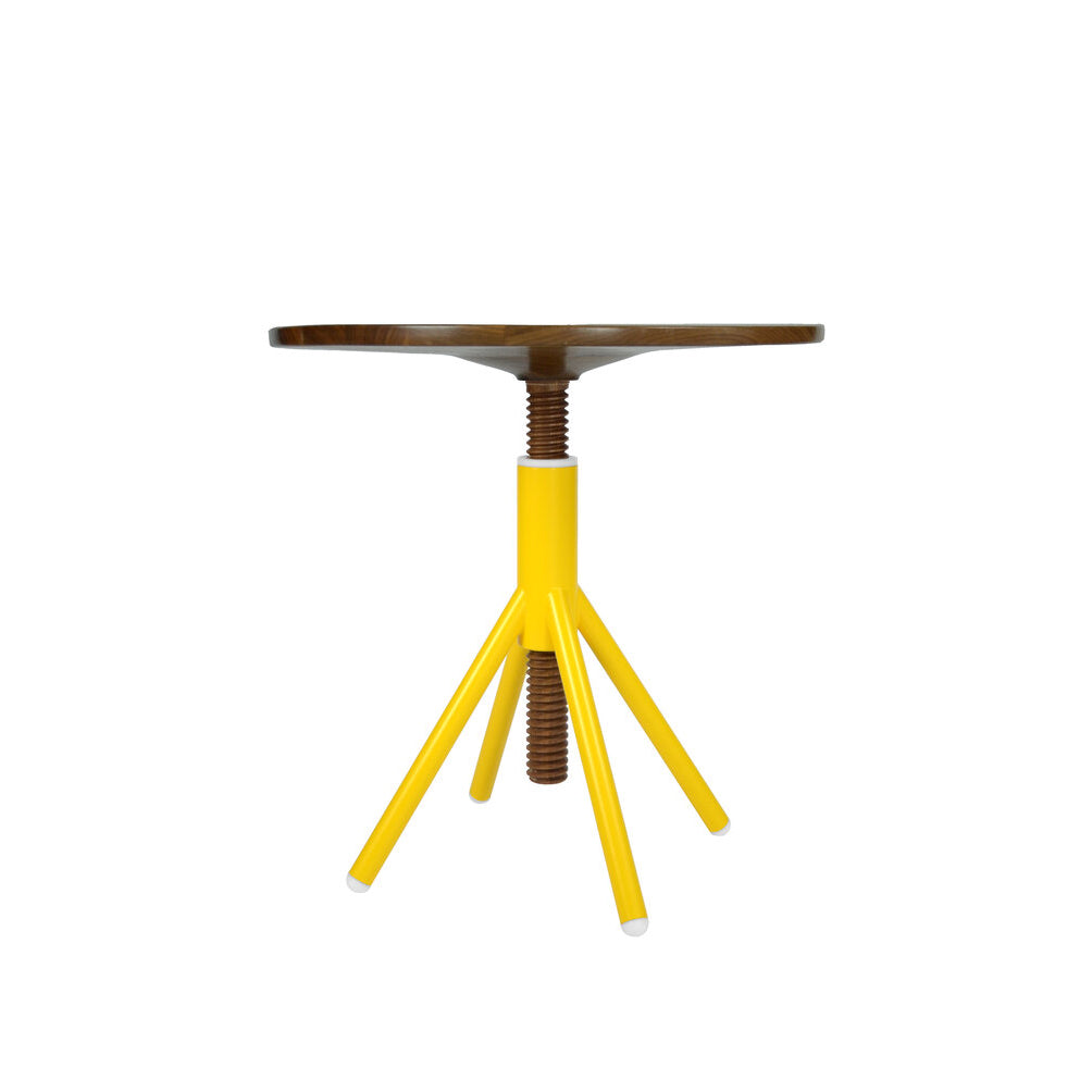 The Thread Family - Bistro Table by Coordination Berlin is a modern, minimalist, height-adjustable piece featuring a round walnut or oak tabletop, supported by three yellow angled legs with a central screw mechanism.