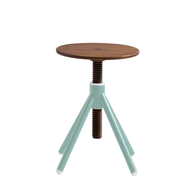 The Thread Family - Stool by Coordination Berlin features a walnut wood seat and three mint-green legs. Its height-adjustable, round seat uses a central screw mechanism, offering a seamless blend of natural wood and pastel for a modern, minimalist design.