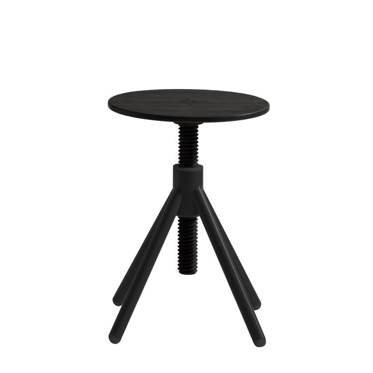 The Thread Family Stool by Coordination Berlin is a black walnut adjustable tripod stool with a circular seat, three legs, and a central screw mechanism for height adjustment. Its minimalist matte finish highlights the elegance of this height-adjustable furniture piece.