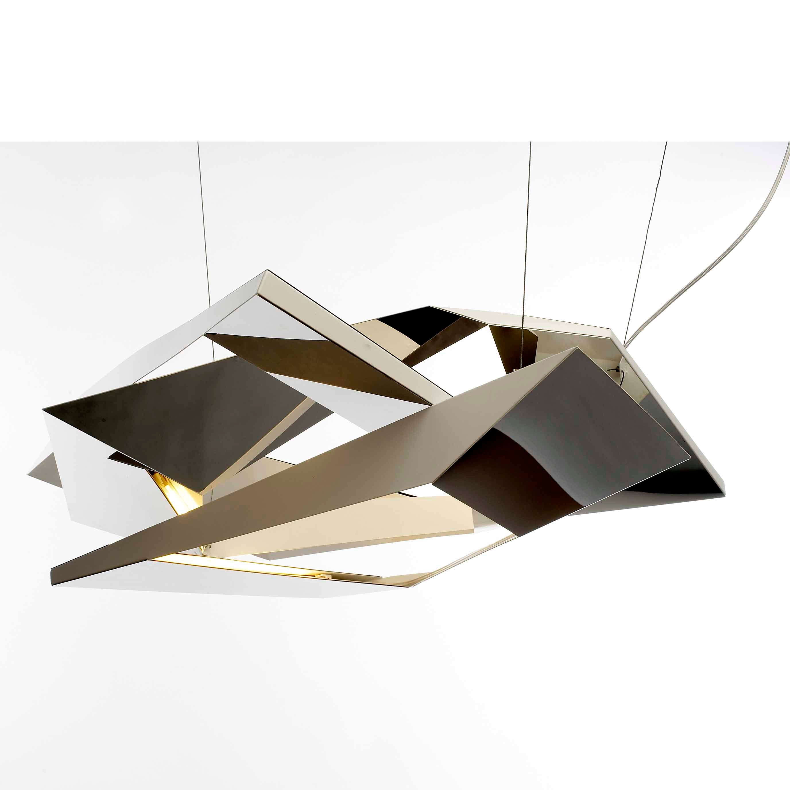 Polygon Crash by Coordination Berlin is a modern geometric pendant light with overlapping angular metal panels in silver and gold tones, crafted from polished stainless steel. It hangs elegantly from thin cables against a plain white background, showcasing its handcrafted precision.
