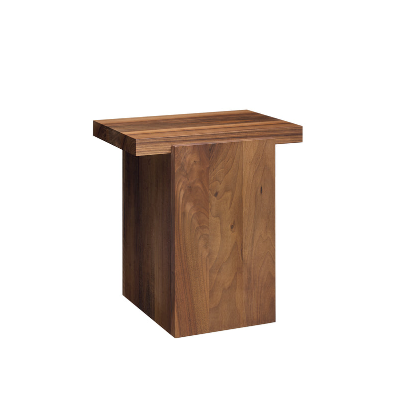 The DT02 TORE sculptural side table by E15 showcases a minimalist design with a rectangular top and inverted T-shaped base. Made from solid wood, its rich brown hue and visible grain add modern yet natural appeal, making it ideal for contemporary living spaces.
