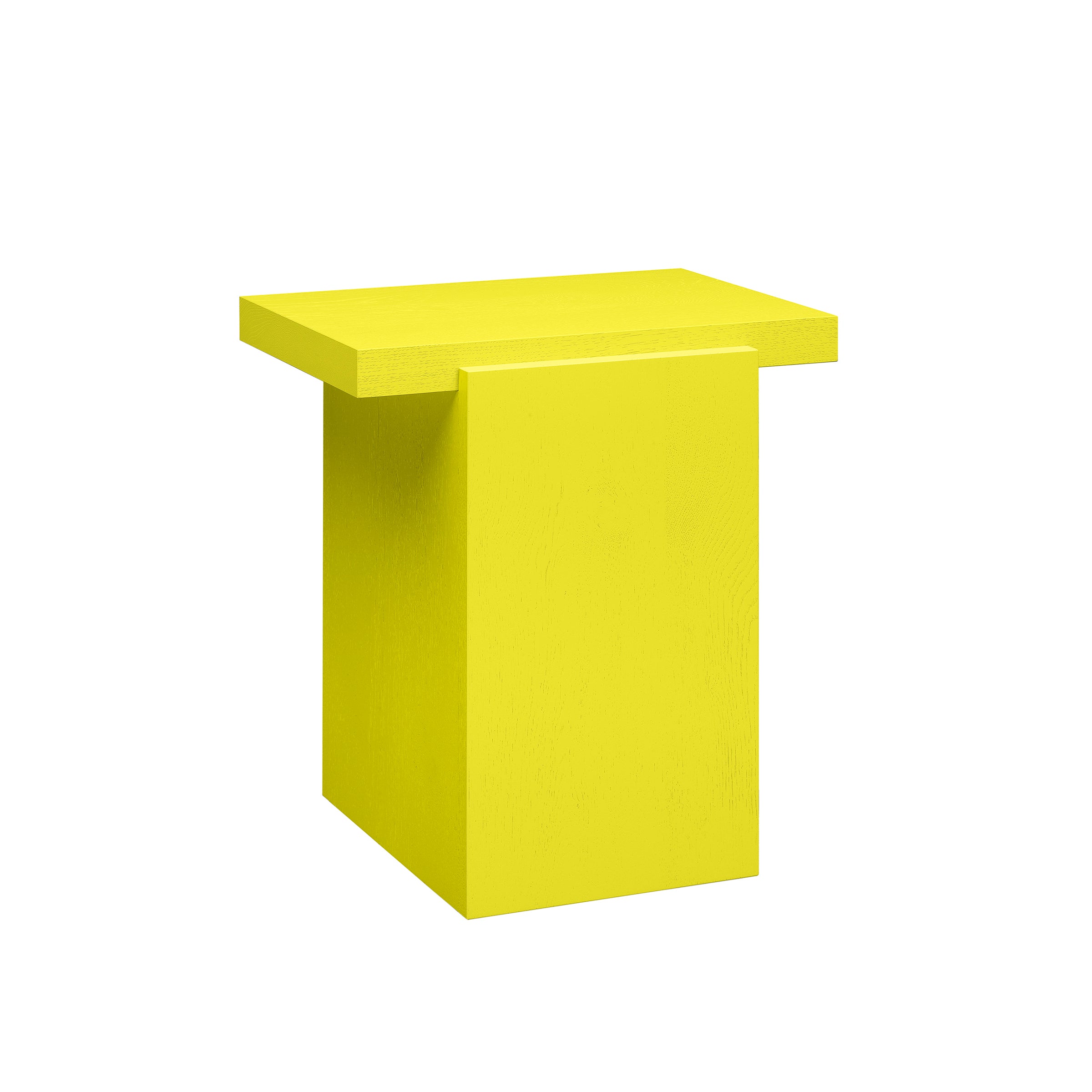The DT02 TORE side table by E15 features a bright yellow finish with a minimalist rectangular top and base. Its geometric design offers a modern, playful element, ideal for those who love sculptural pieces in their decor.