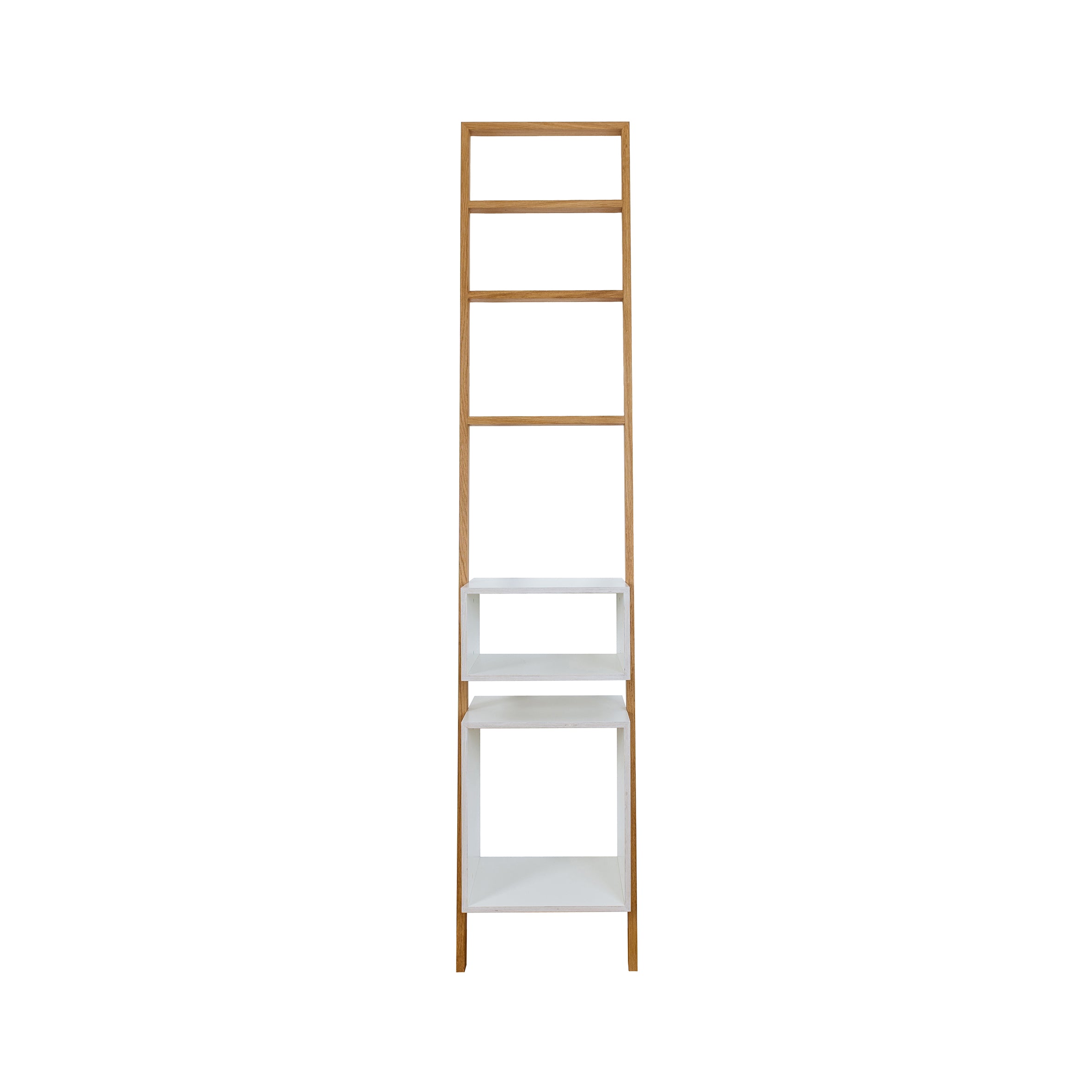 The Brecht by Das kleine b is a modern wooden ladder shelf with three white storage compartments and three open spaces. It offers a minimalist design that seamlessly blends into any space, perfect for saving room against a white backdrop.