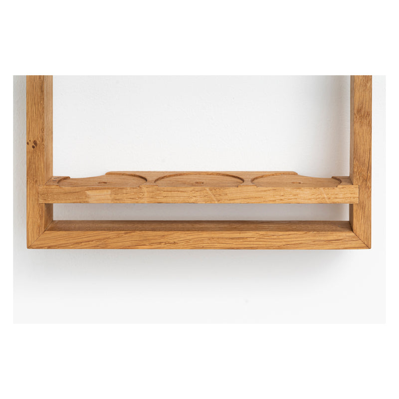 The Spice Rack Bocuse by Das kleine b features an oak construction with a natural finish. It boasts a minimalist rectangular design accented by a small groove on the inside edge, enhancing its elegant simplicity.