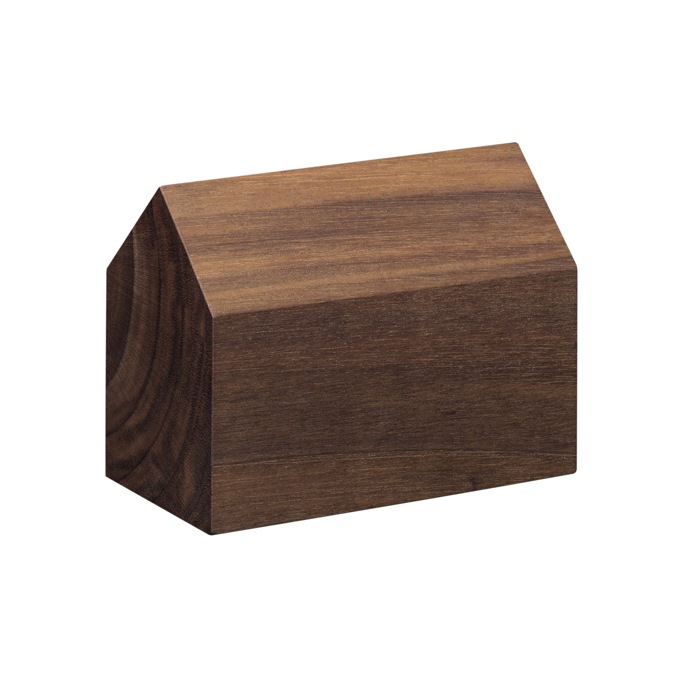 The AC10 HAUS by E15, made from European oak, resembles a simple house with its triangular roof. Its smooth texture and dark brown grain patterns make it a perfect minimalist desk accessory or paperweight.
