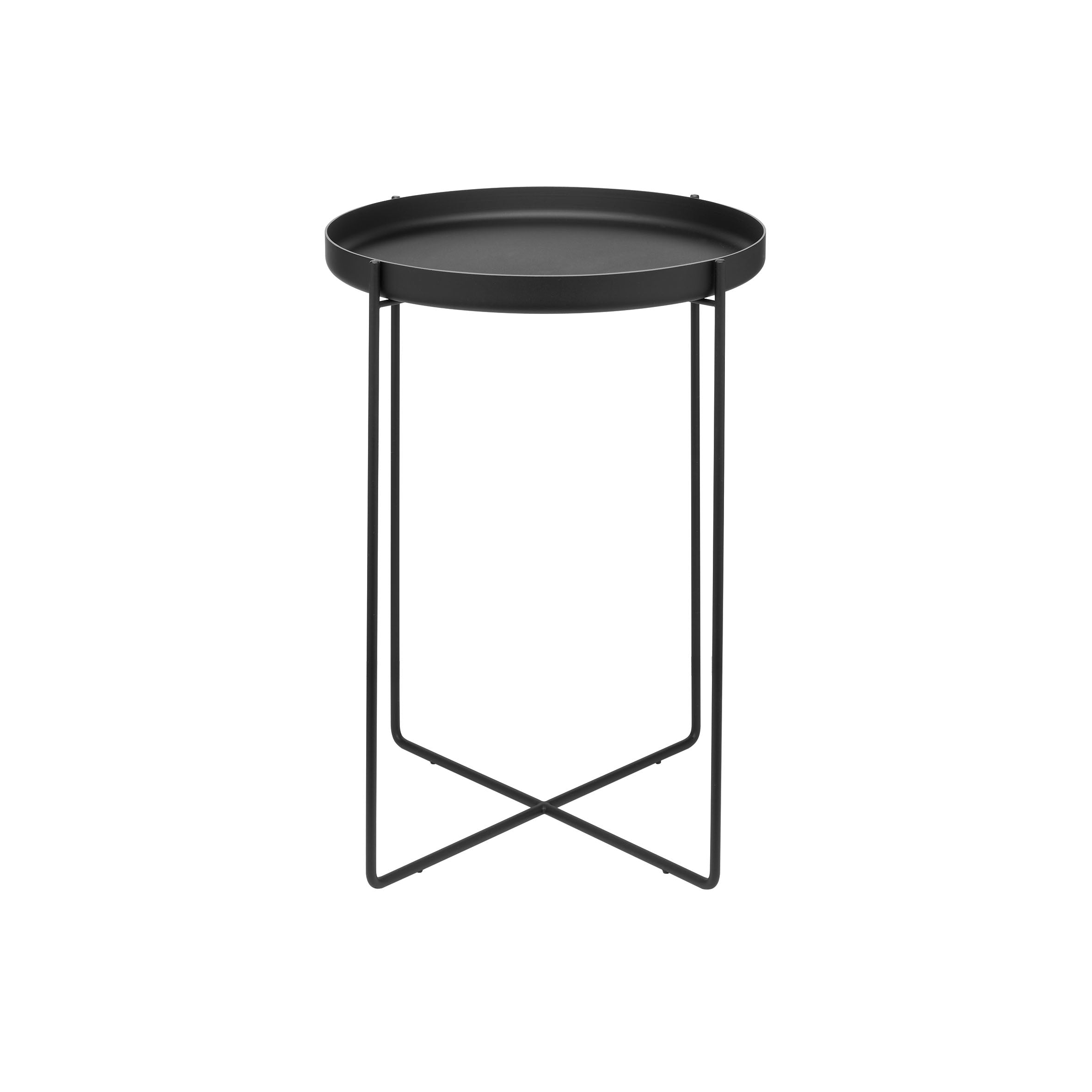 The CM05 HABIBI by E15 is a chic black tray side table with a round top and minimalist design, featuring slender metal legs forming an X-shape for robust support. Its simple, modern style fits seamlessly into diverse interiors.