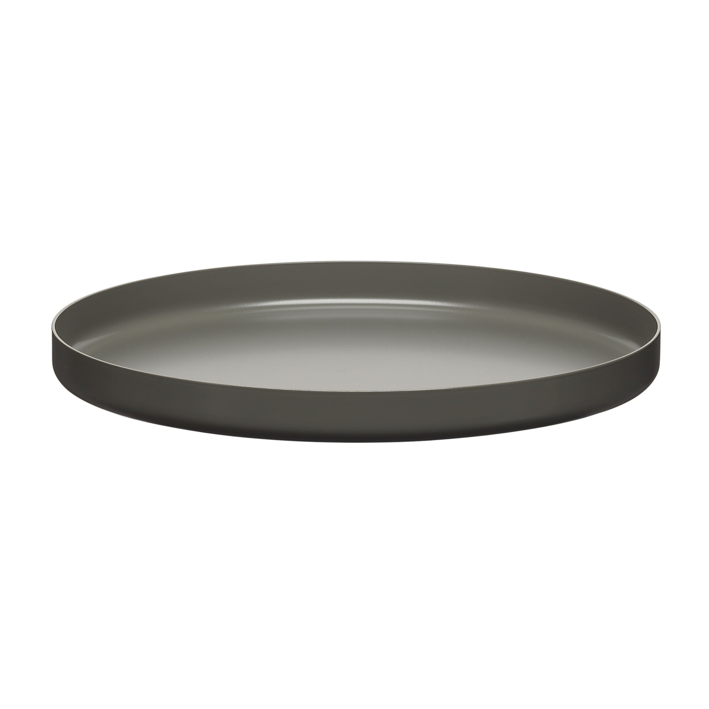 The CM05 HABIBI by E15 is a minimalist round serving tray that becomes a chic side table with its flat base and raised edges. Its smooth, metallic surface mimics polished brass, providing a modern, sleek appearance thats handmade and unique.