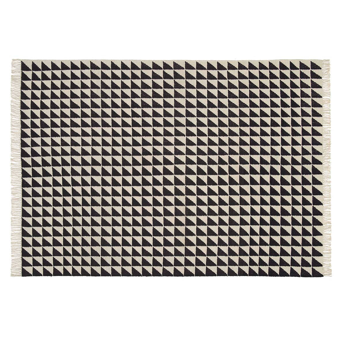 The CP04 IZA by E15 features a geometric grid with black triangles on beige, made from hand-spun lamb’s wool using traditional weaving methods, and is elegantly finished with fringes on the shorter sides.