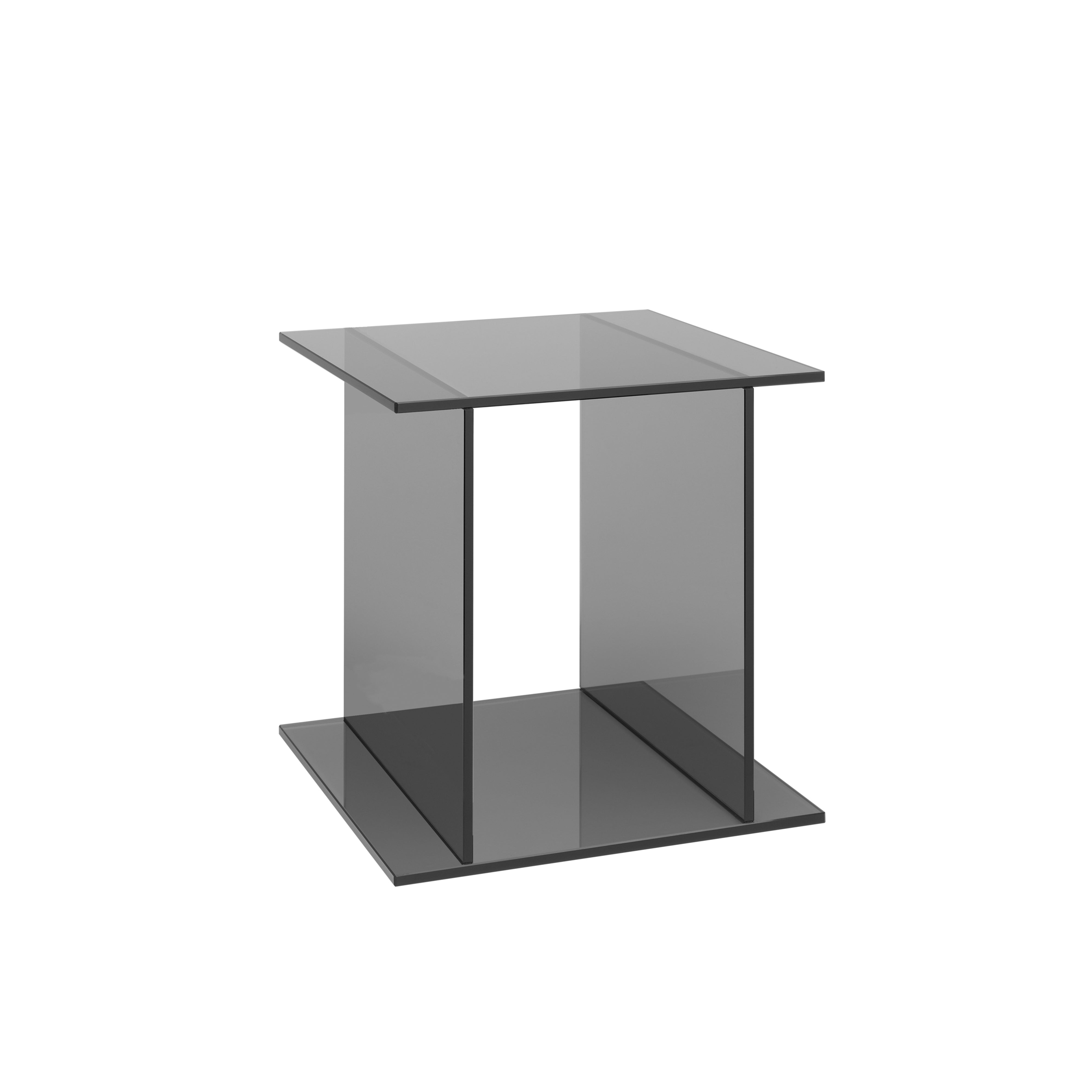 The CT07 Drei by E15 is a minimalist, transparent square glass table with a sleek modern design, perfect as a stylish side table. It features open sides and vertical glass panels for support, blending functionality and elegance in any space.