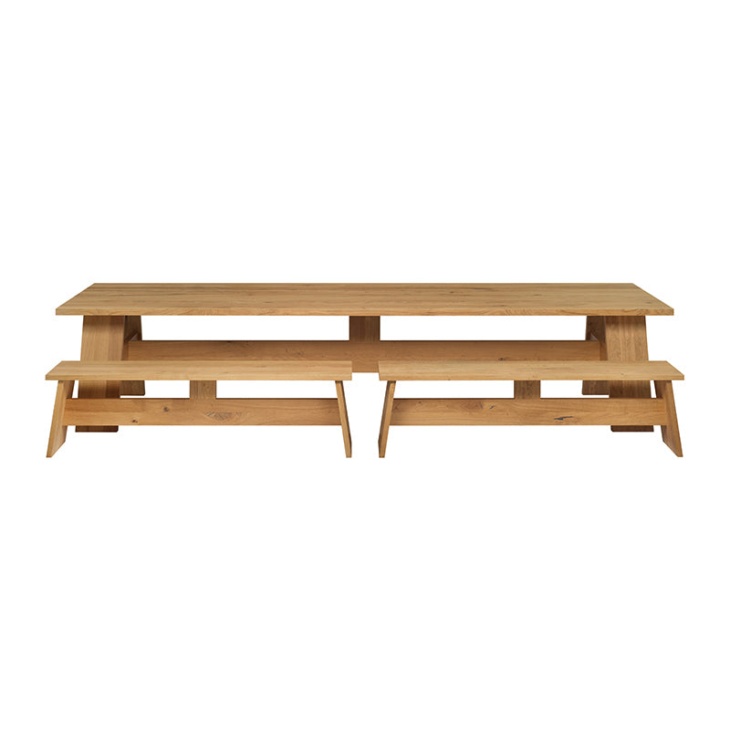 The E15 DC01 FAYLAND, a long rectangular solid wood picnic table with two matching benches, features an elegant design. Its clean lines and natural finish evoke David Chipperfields minimalist style, perfectly set against a plain white background.