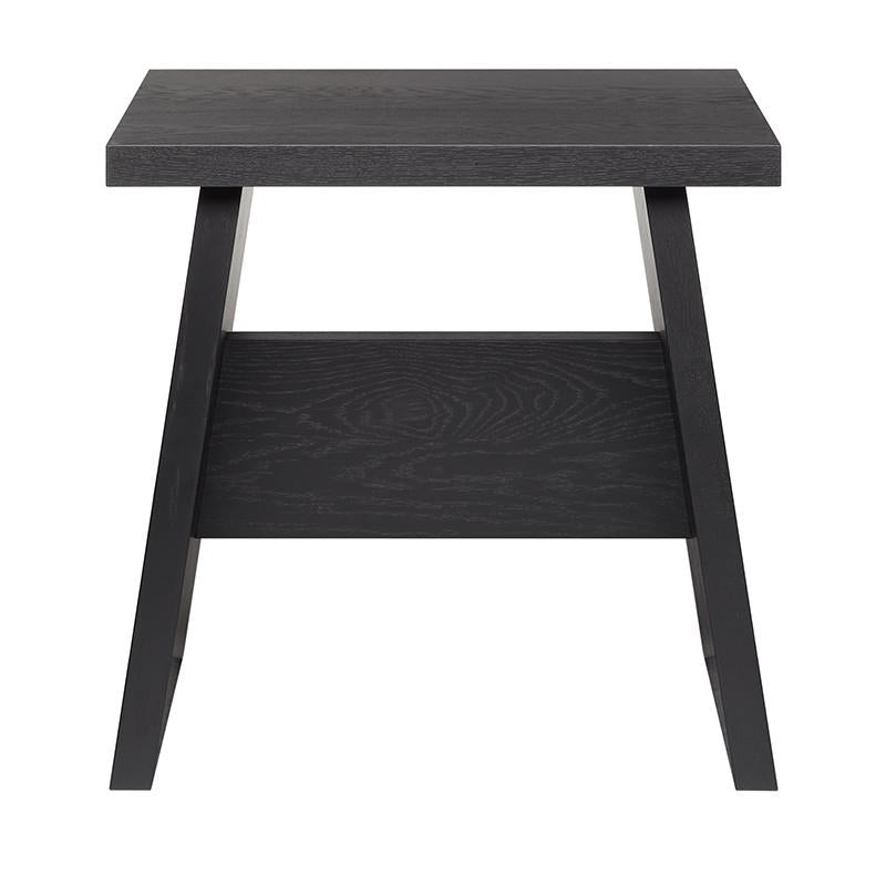 The DC03 LANGLEY by E15 is a minimalist, modern small black wooden side table made from European walnut. It features angled legs connected near the base by a horizontal support beam and a wide, flat top.