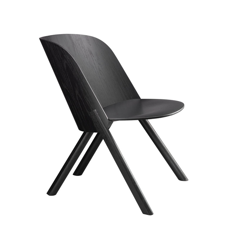 The EC05 THAT by E15 is a modern black wooden chair with a smooth, curved backrest and an upholstered seat. As part of a sleek seating series, it has four angled legs for a contemporary look.