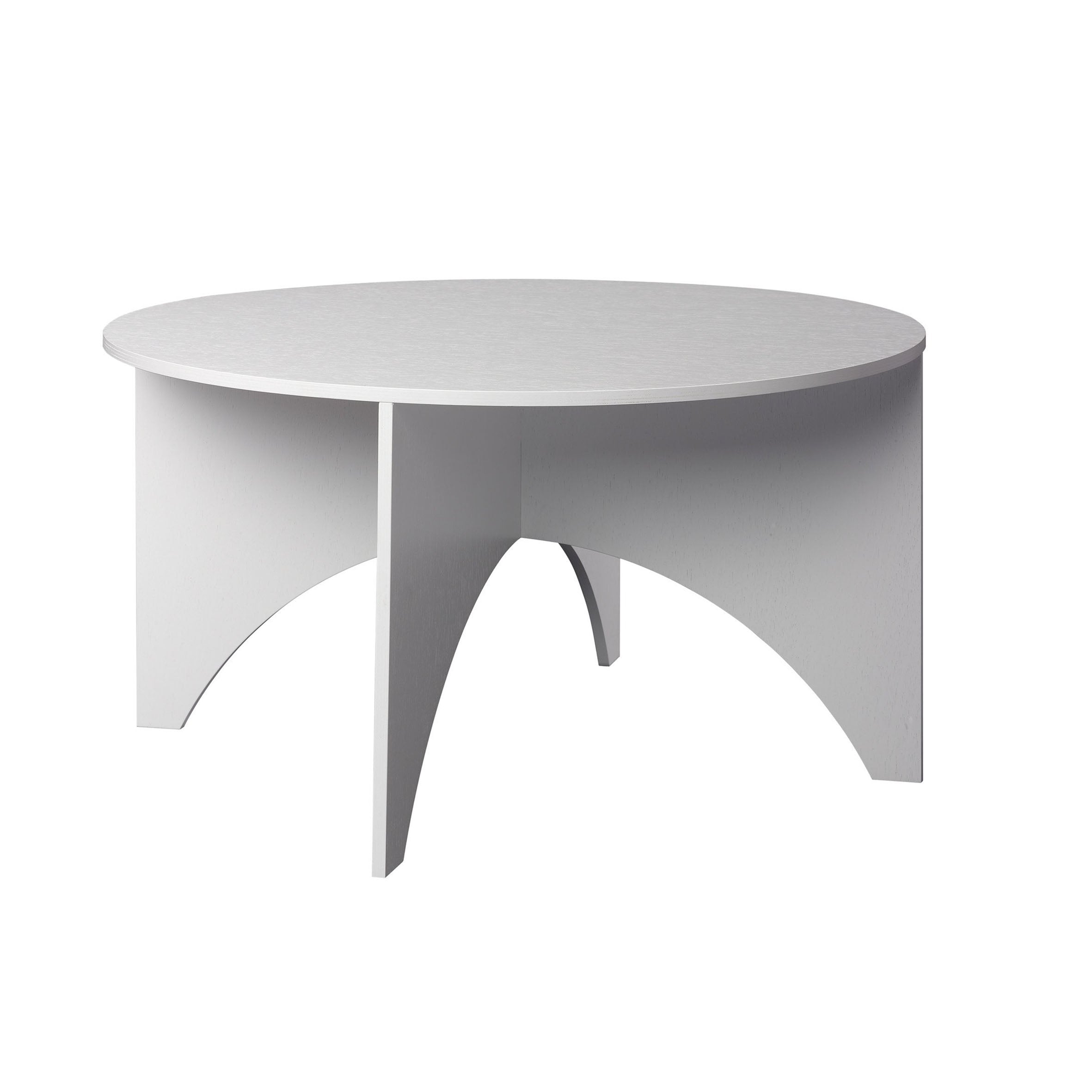 The E15 FK05 CHARLOTTE is a modern minimalist coffee table inspired by Ferdinand Kramer, featuring a round white surface elegantly supported by four arching legs converging at a central point.