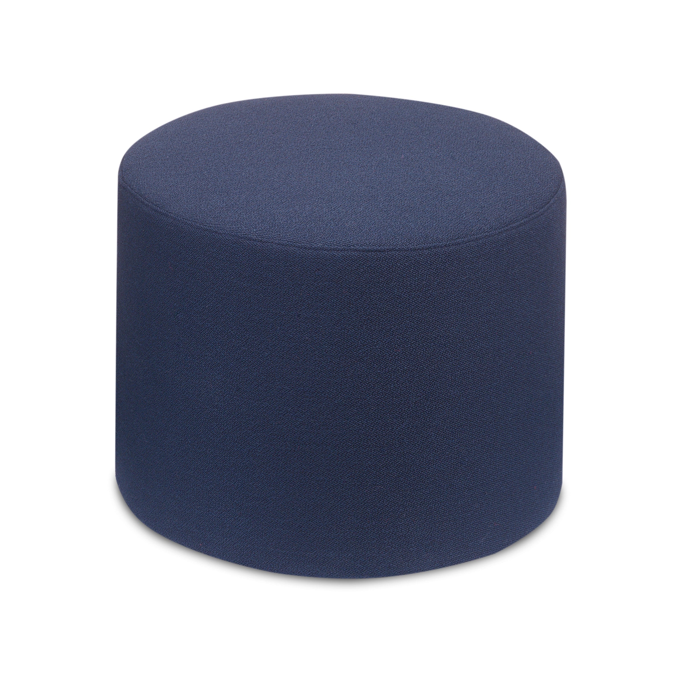 The SF06 KERMAN by E15 is a round, dark blue fabric ottoman with a simple cylindrical design on a white background. It offers extra seating or footrest use, featuring removable covers for easy maintenance and seamless integration with modular furniture systems.