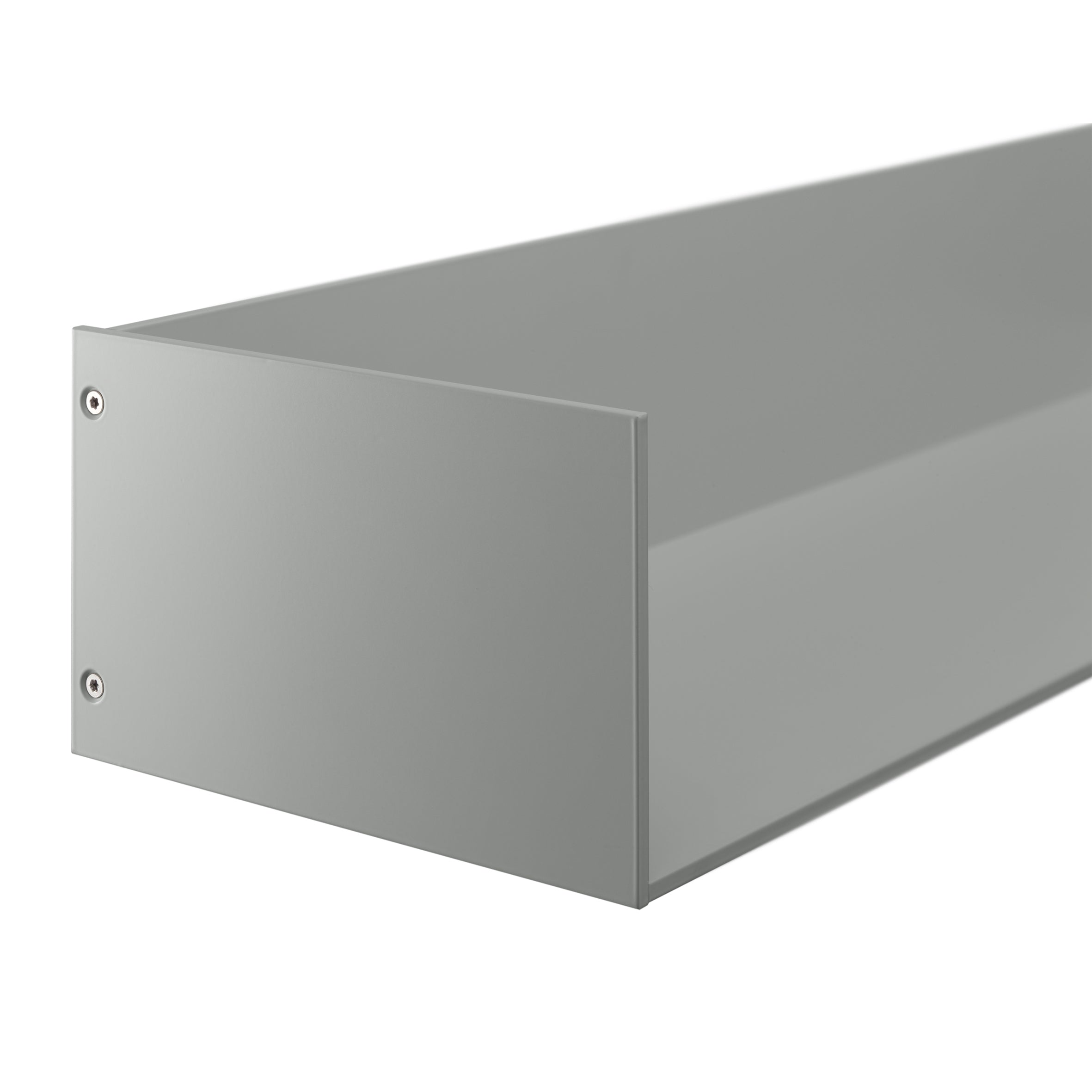 A close-up of the sleek SH06 PROFIL duct cover by E15 showcases its minimalist design, with a rectangular shape and smooth matte finish. Two visible screws secure the front panel, adding to its modern aesthetic.
