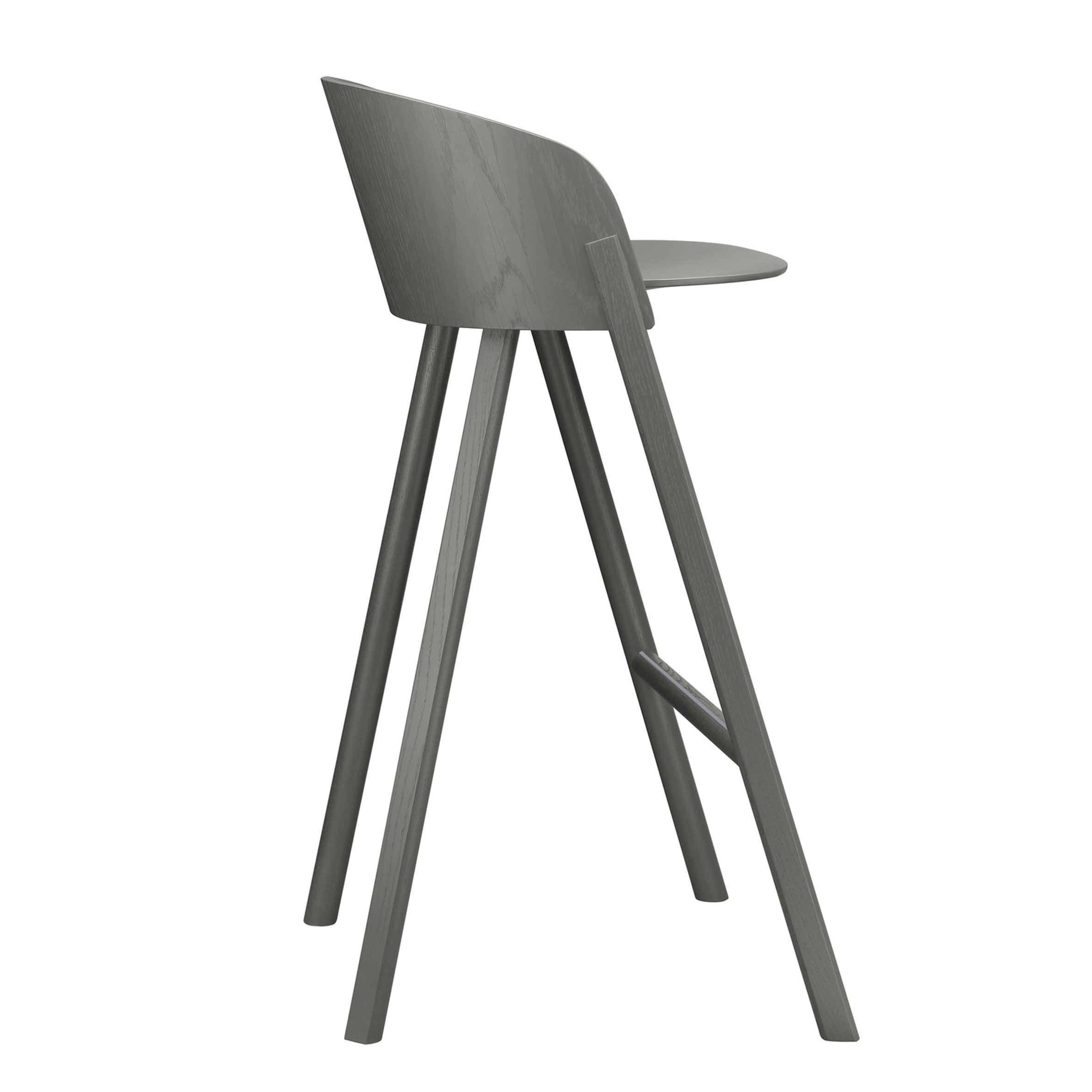 The E15 ST12 OTHER is a modern, minimalist dark gray stool with a curved backrest and seat, subtly upholstered for comfort. It features tall, slender legs and a sleek design ideal for contemporary interiors, showcasing clean lines and a simple aesthetic from the side view.